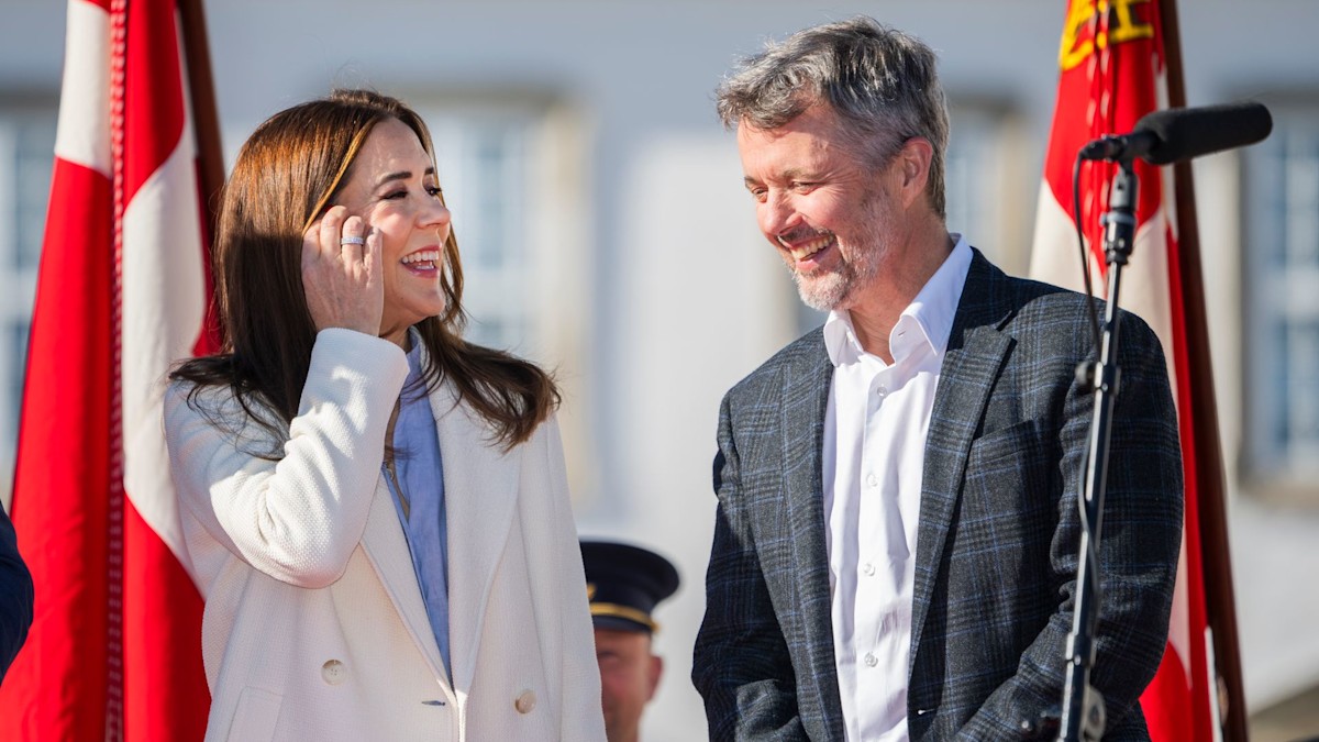 King Frederik and Queen Mary of Denmark share look of love as they are welcomed to new home