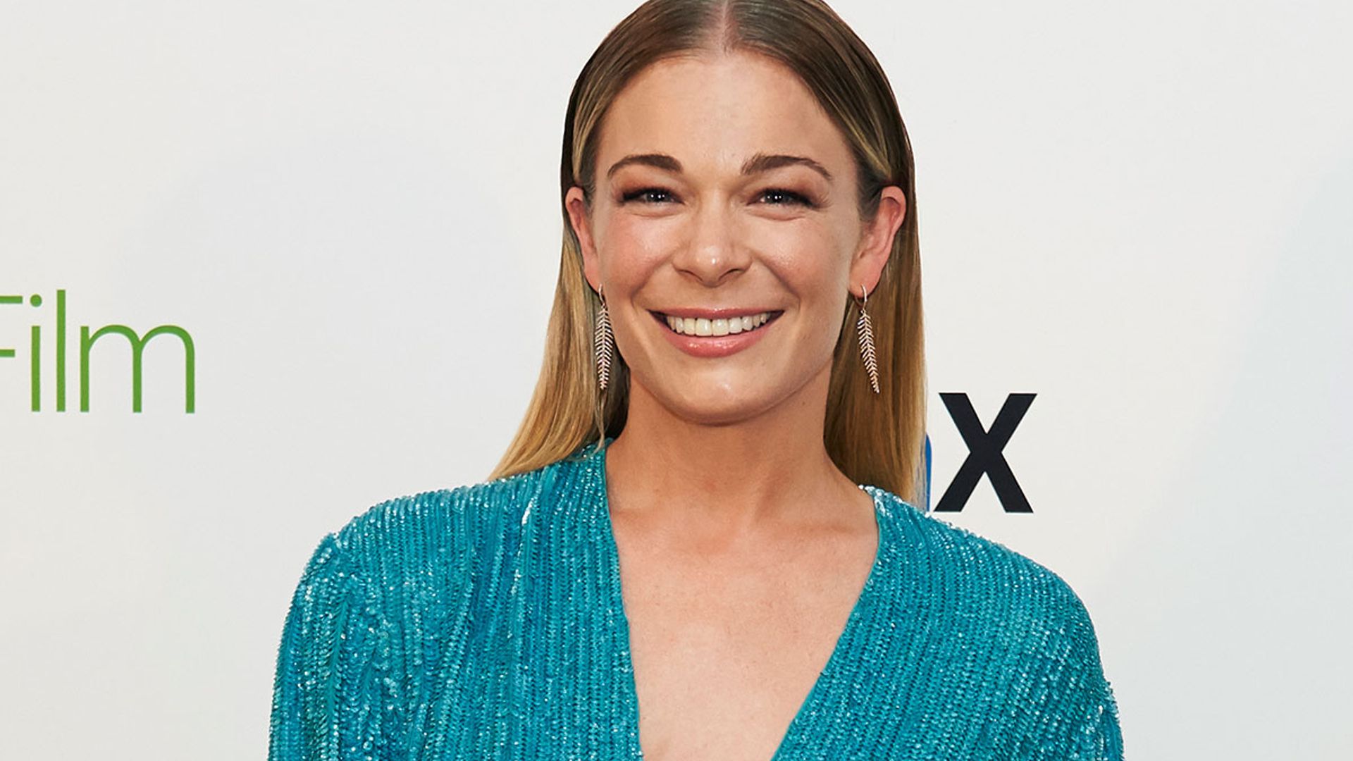 LeAnn Rimes Showcases Sculpted Figure In Revealing Outfit Alongside