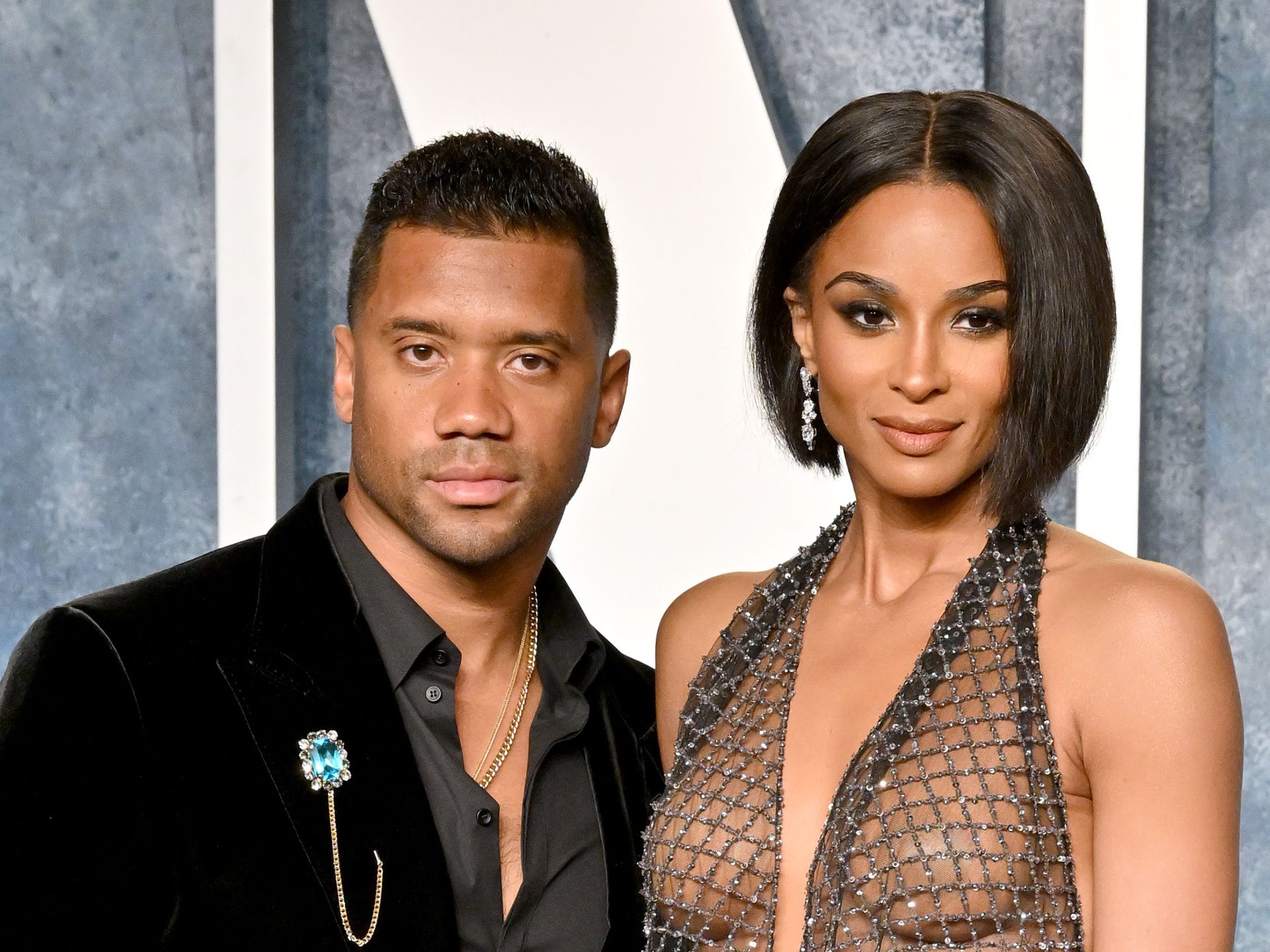 Ciara shows off her growing baby bump in white dress while taking a selfie  with her husband Russell Wilson