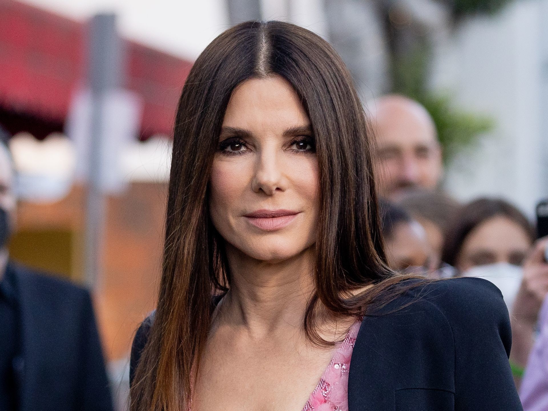 Sandra Bullock glows as she opens doors into huge family home with 