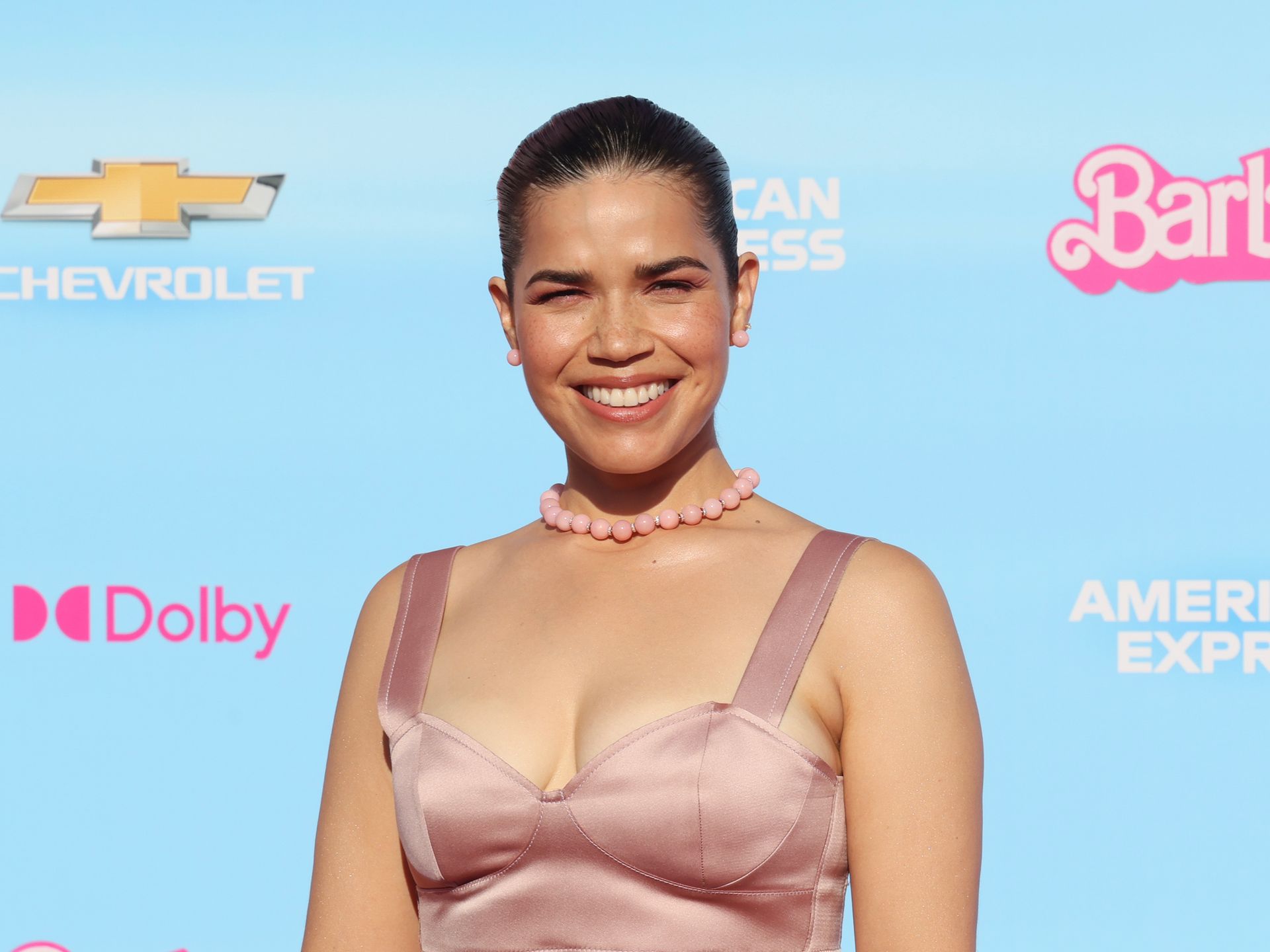 Please help me find these pink sneakers worn by America Ferrera in