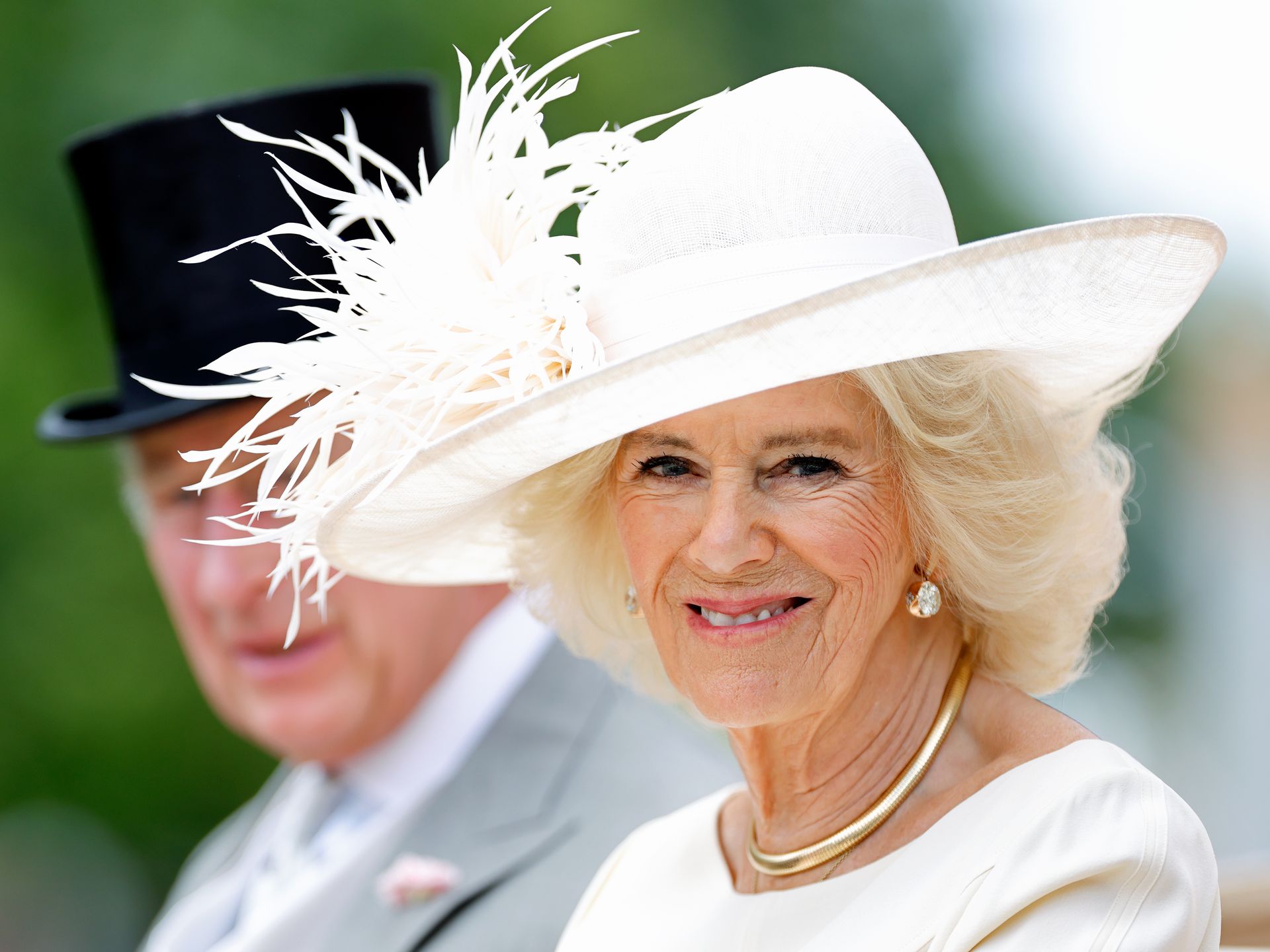 Queen Camilla Dons Classic Chanel Cap-Toe Pumps at Buckingham