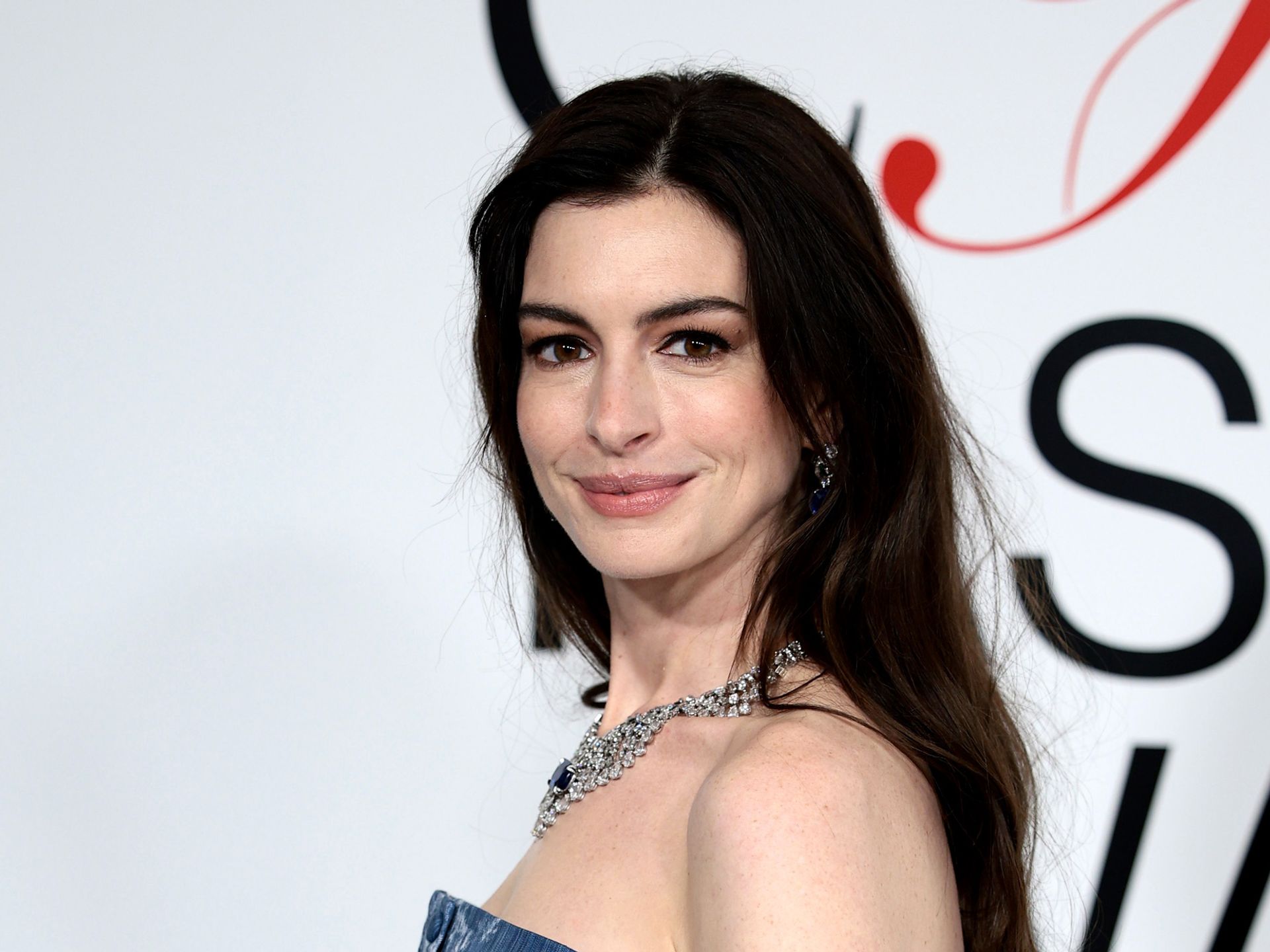 Anne Hathaway stuns in a bikini in latest photos as she candidly discusses  mental health and her two children