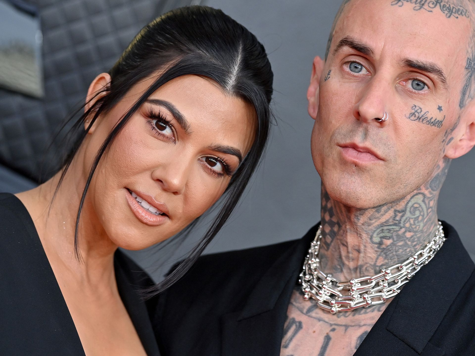 Travis Barker sparks debate as he snubs Kourtney Kardashian's three kids in  art tribute | HELLO!