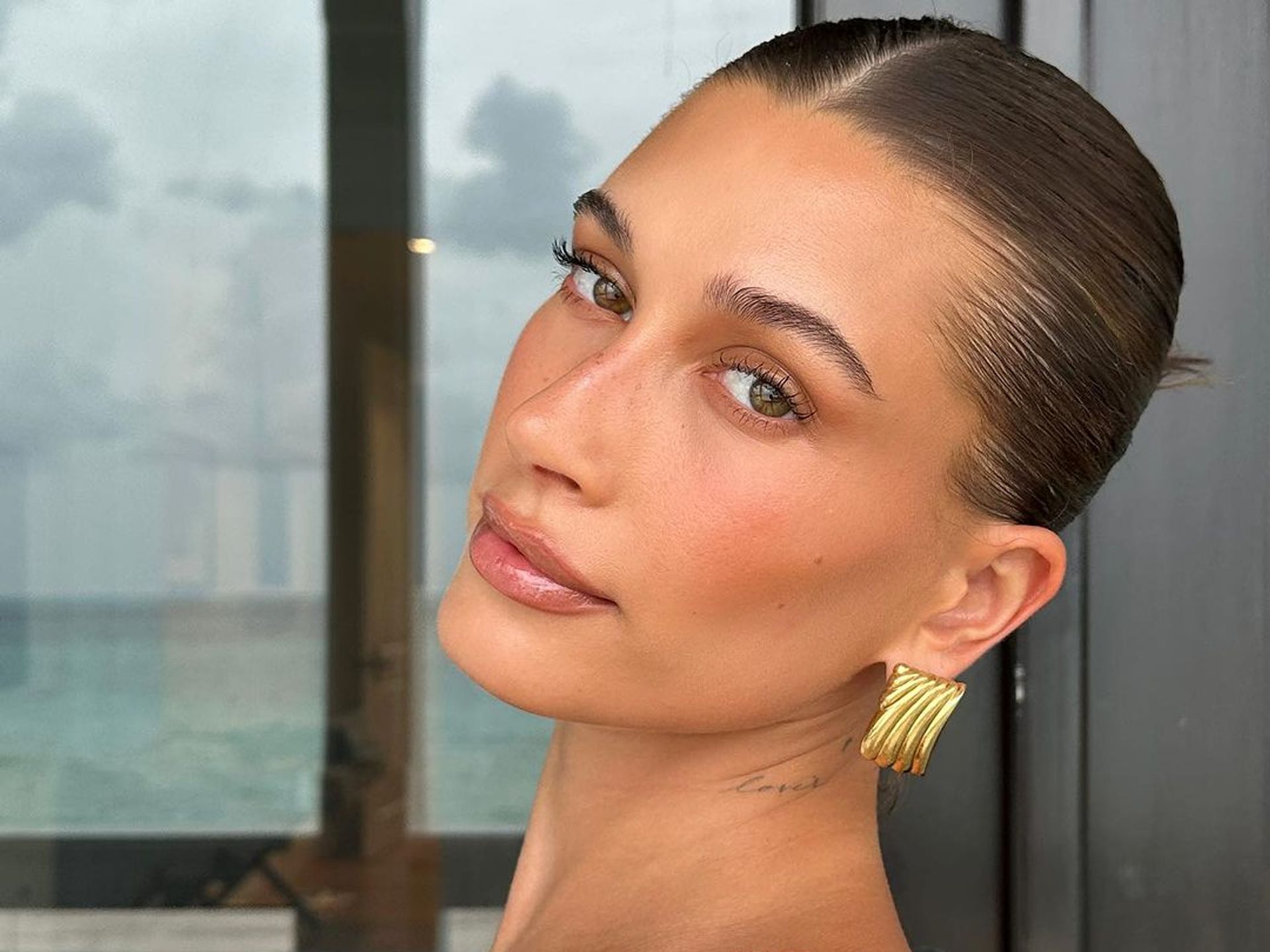 Hailey Bieber shows off bare baby bump for the first time in glittering  crop top – see photos | HELLO!