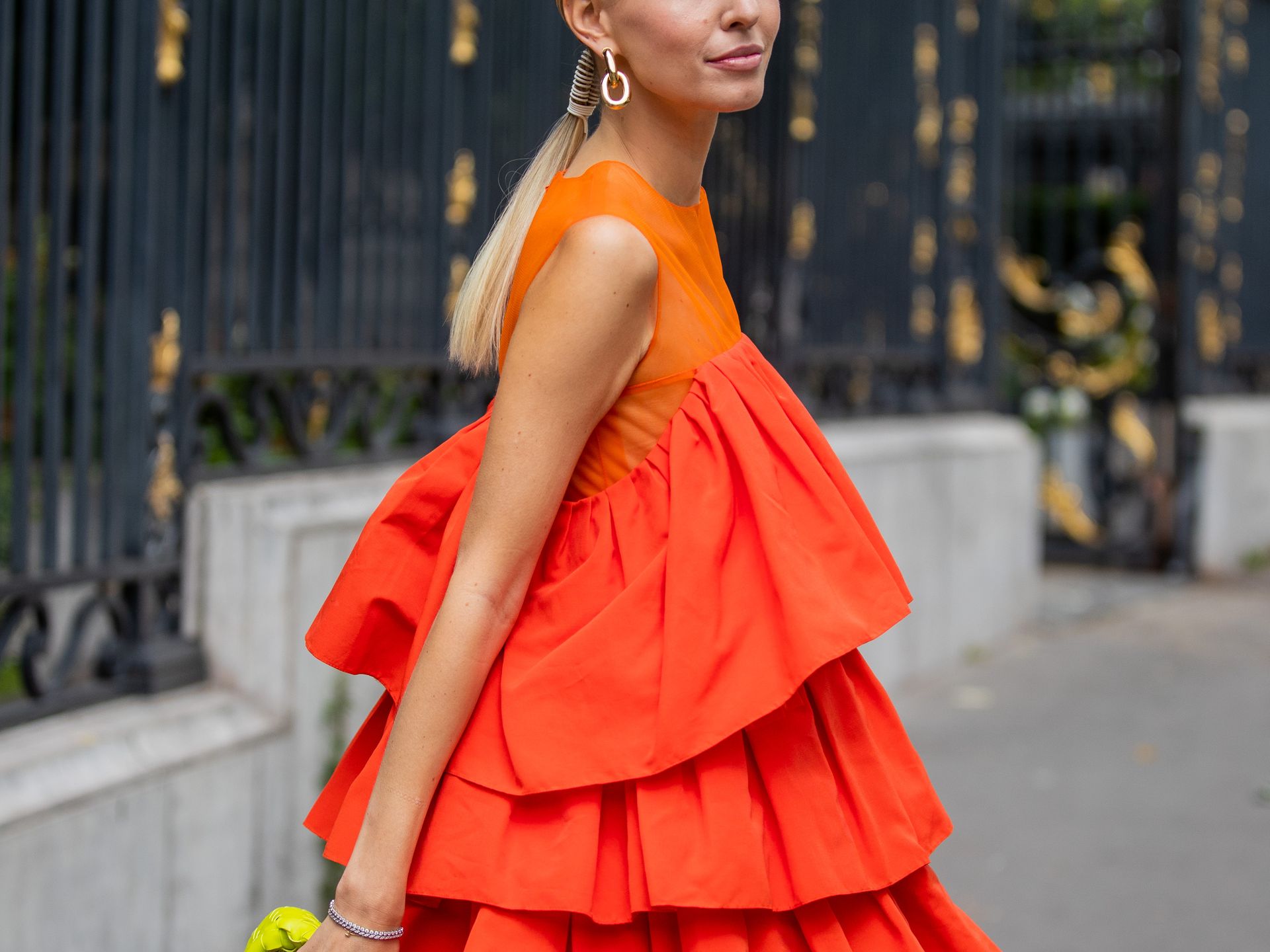 Orange dresses are everywhere right now – 9 we're loving for