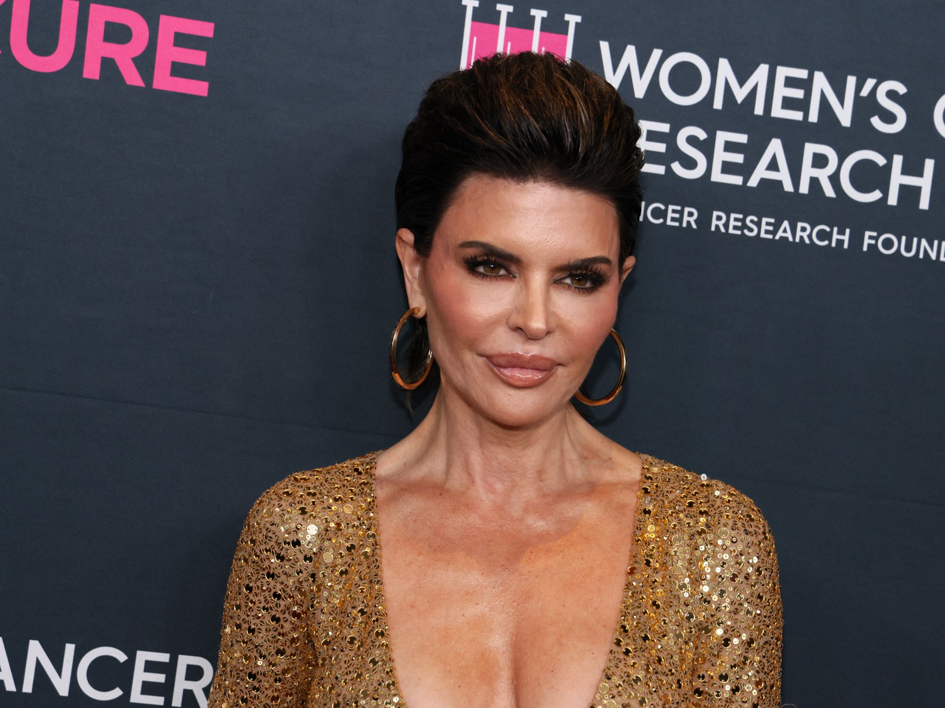 Lisa Rinna's ravishing latex catsuit might be her most daring look