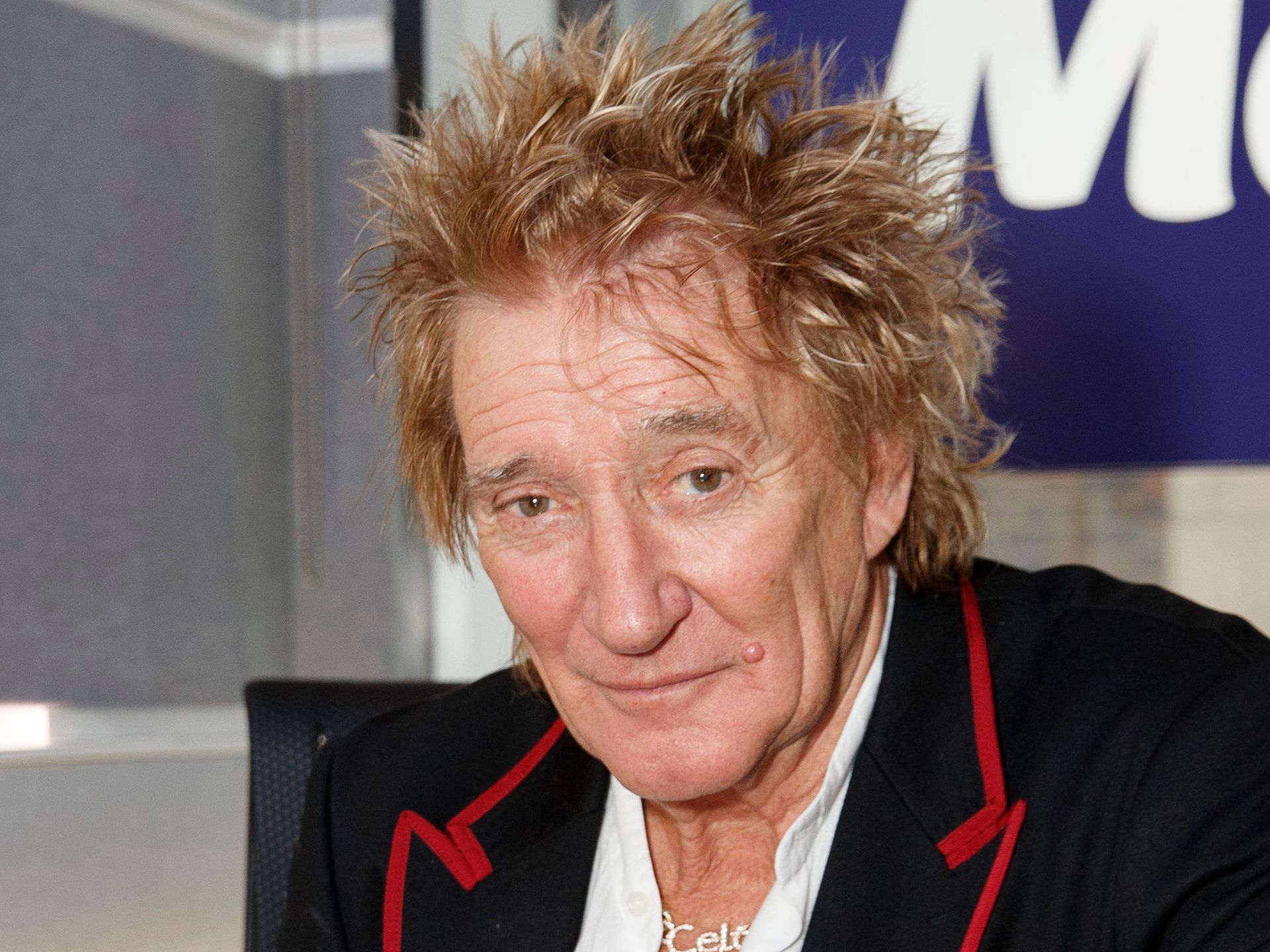 Rod Stewart's model son Alastair towers above him in matching