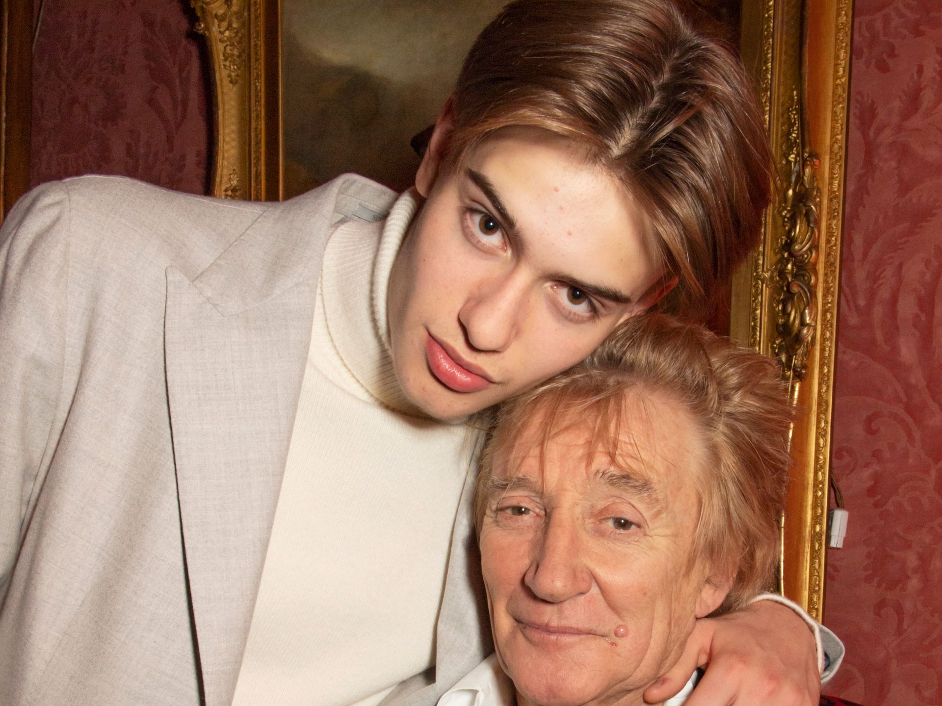 Rod Stewart's model son Alastair towers above him in matching