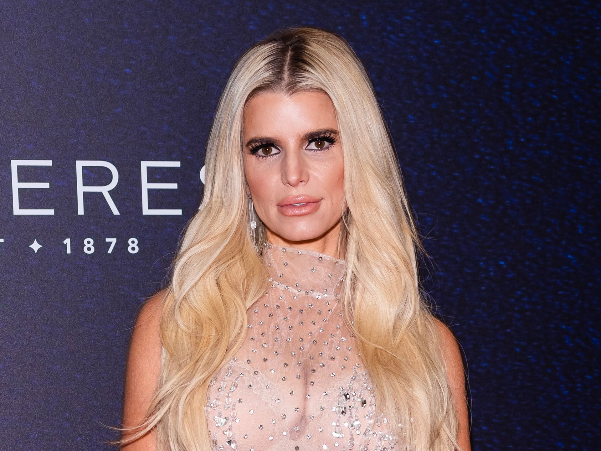Jessica Simpson Sparkles in Completely Sheer Dress at 2023 FN