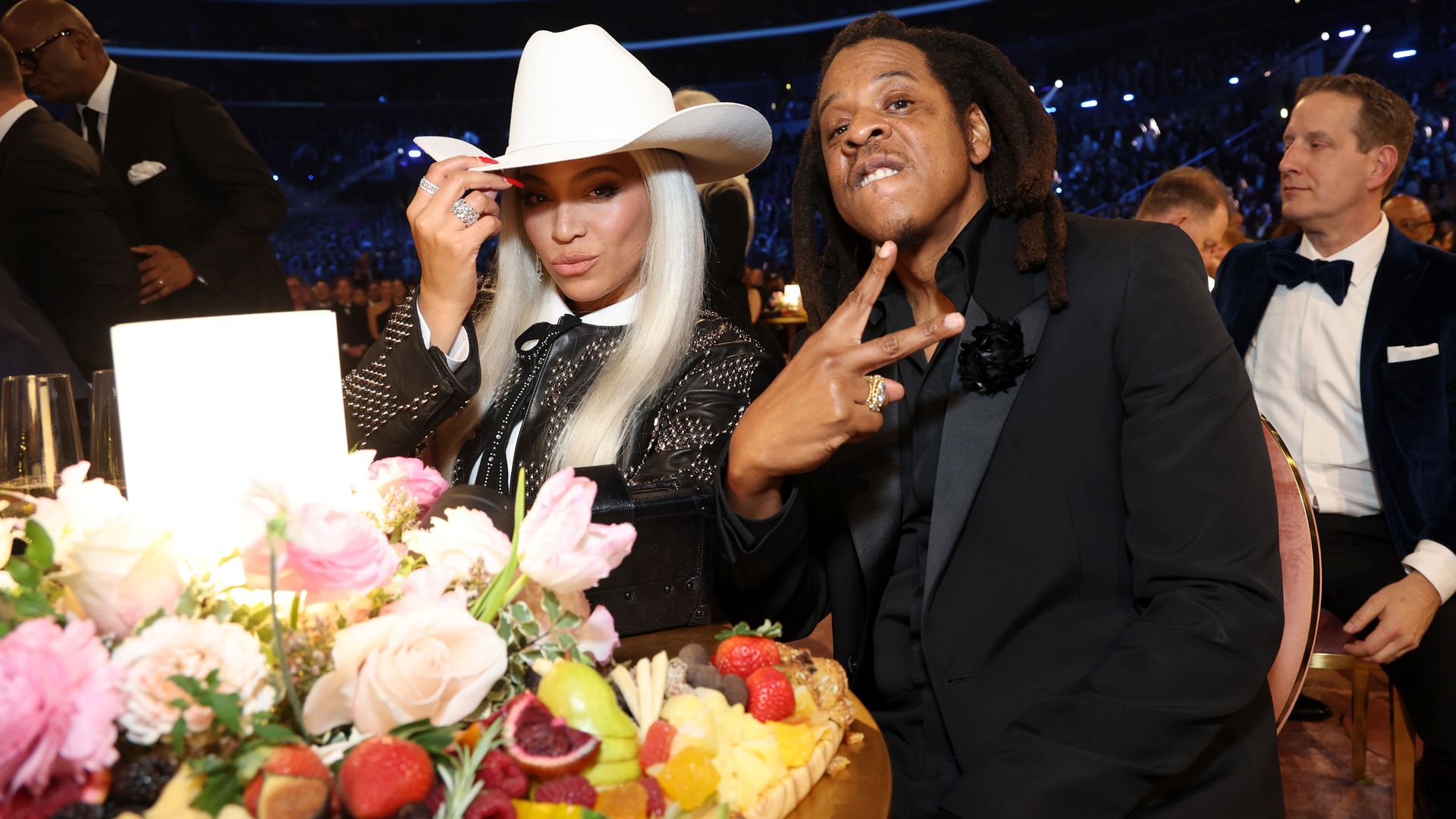 Beyoncé and Jay-Z twin in sharp gray suits on star-studded date