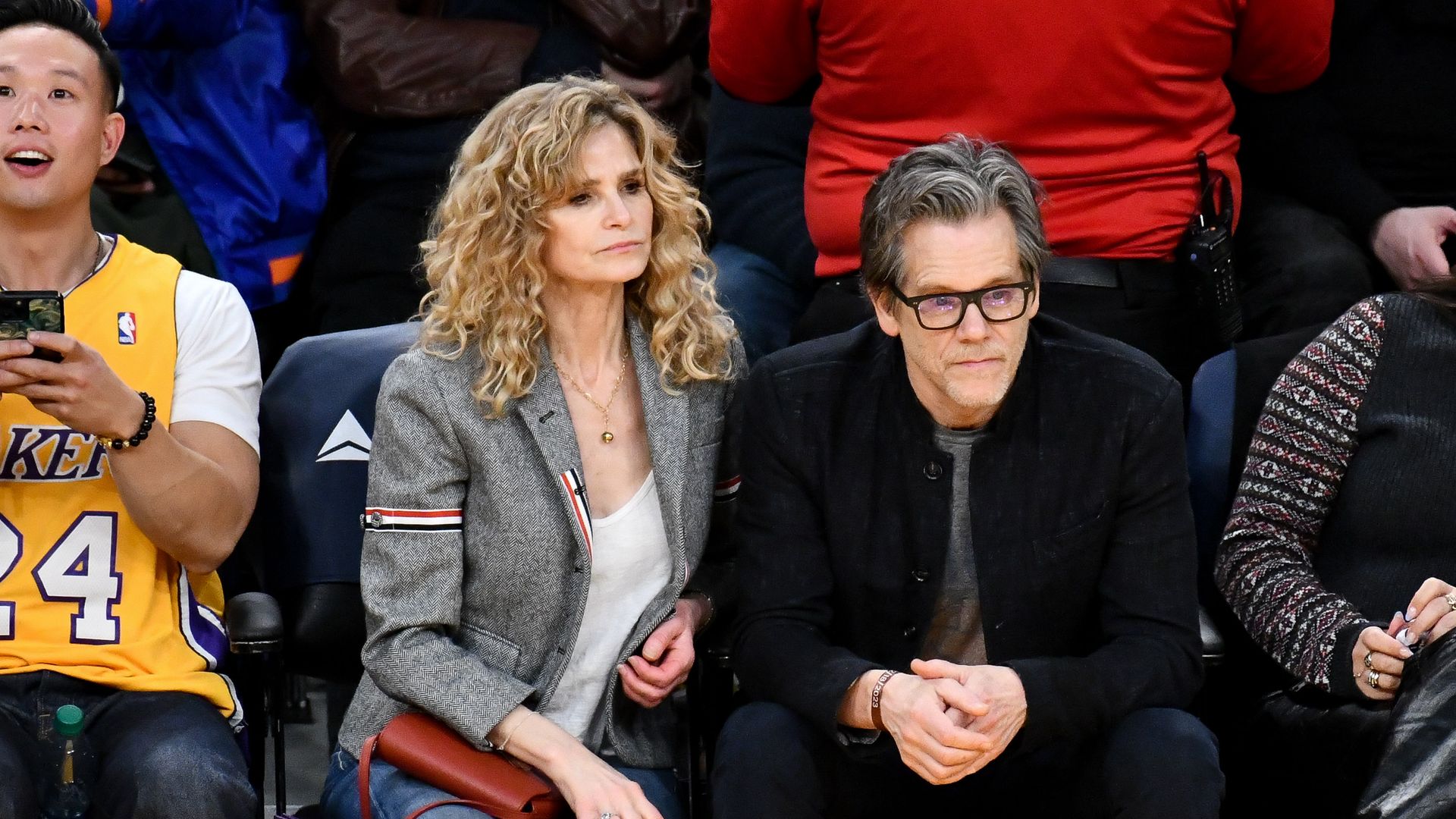 Kevin Bacon and Kyra Sedgwick attend a basketball game between the Los Angeles Lakers and the New York Knicks at Crypto.com Arena on December 18, 2023 in Los Angeles, California. NOTE TO USER: User expressly acknowledges and agrees that, by downloading and or using this photograph, User is consenting to the terms and conditions of the Getty Images License Agreement. (Photo by Allen Berezovsky/Getty Images)