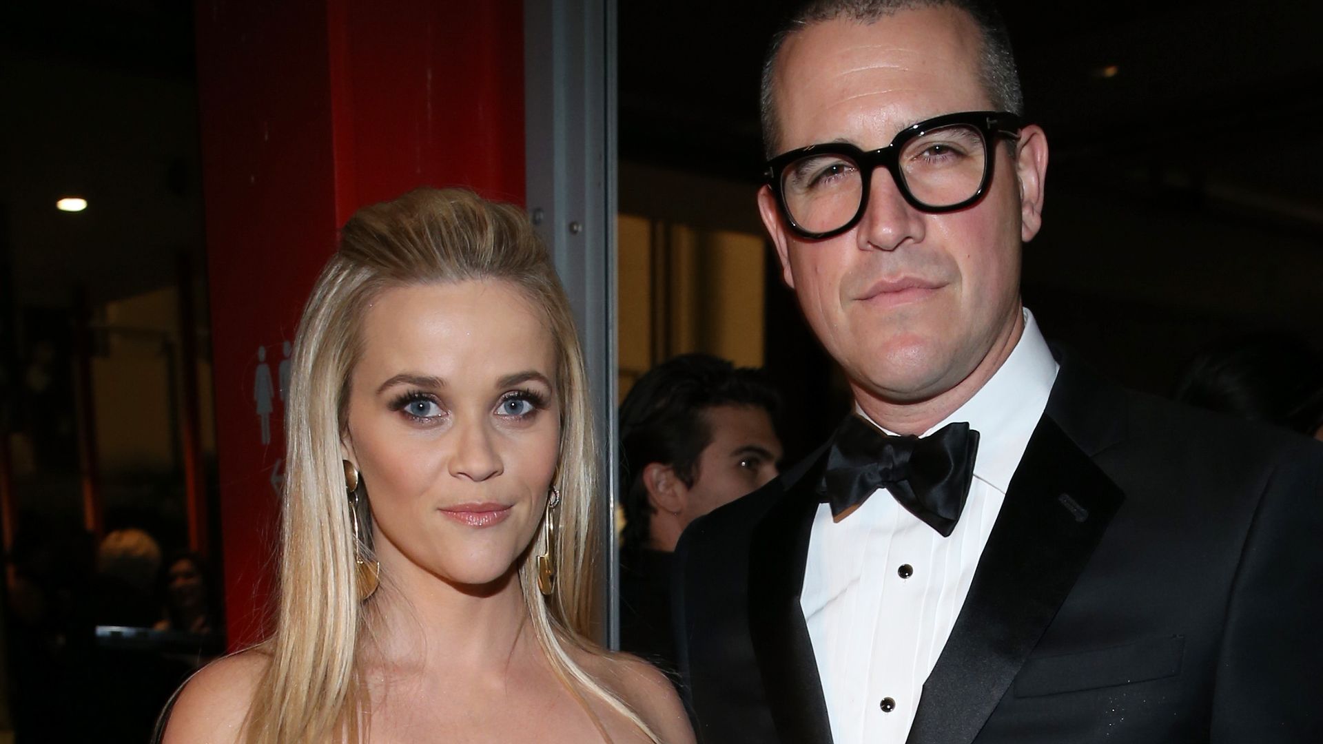 Reese Witherspoon in a black dress and Jim Toth in a suit attend LACMA 2015 Art+Film Gala 
