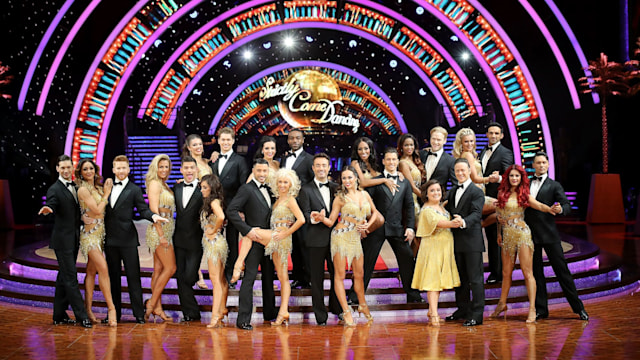 strictly dancers posing on stage 