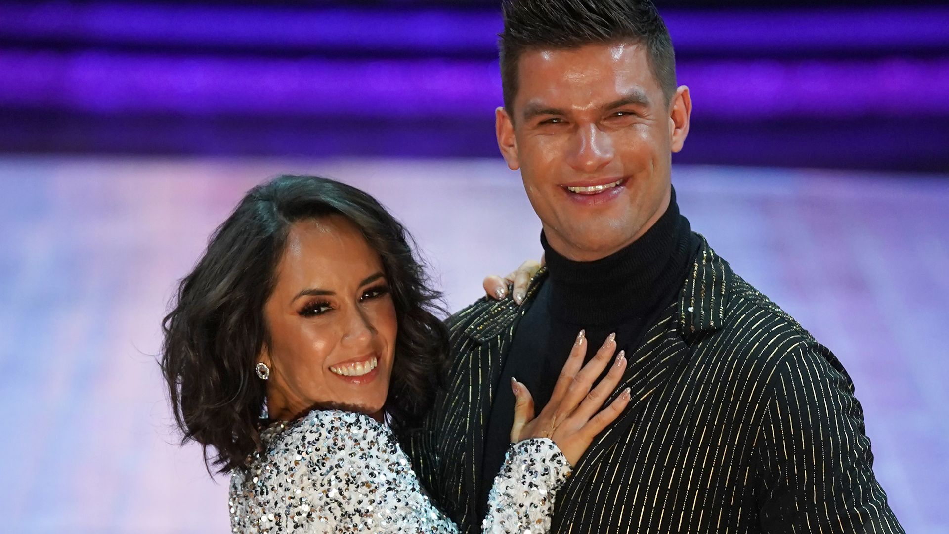 Janette Manrara models rarely-seen backless wedding midi dress in intimate photo with Aljaz thumbnail