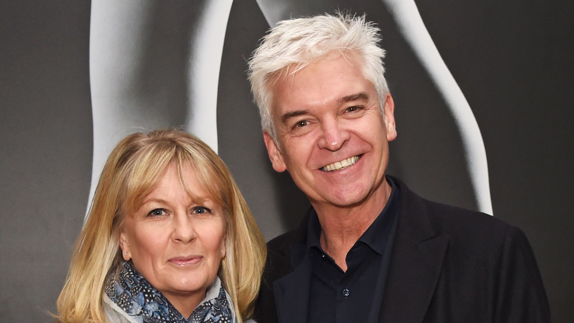 Phillip Schofield and estranged wife Stephanie Lowe show off new puppies during birthday day out