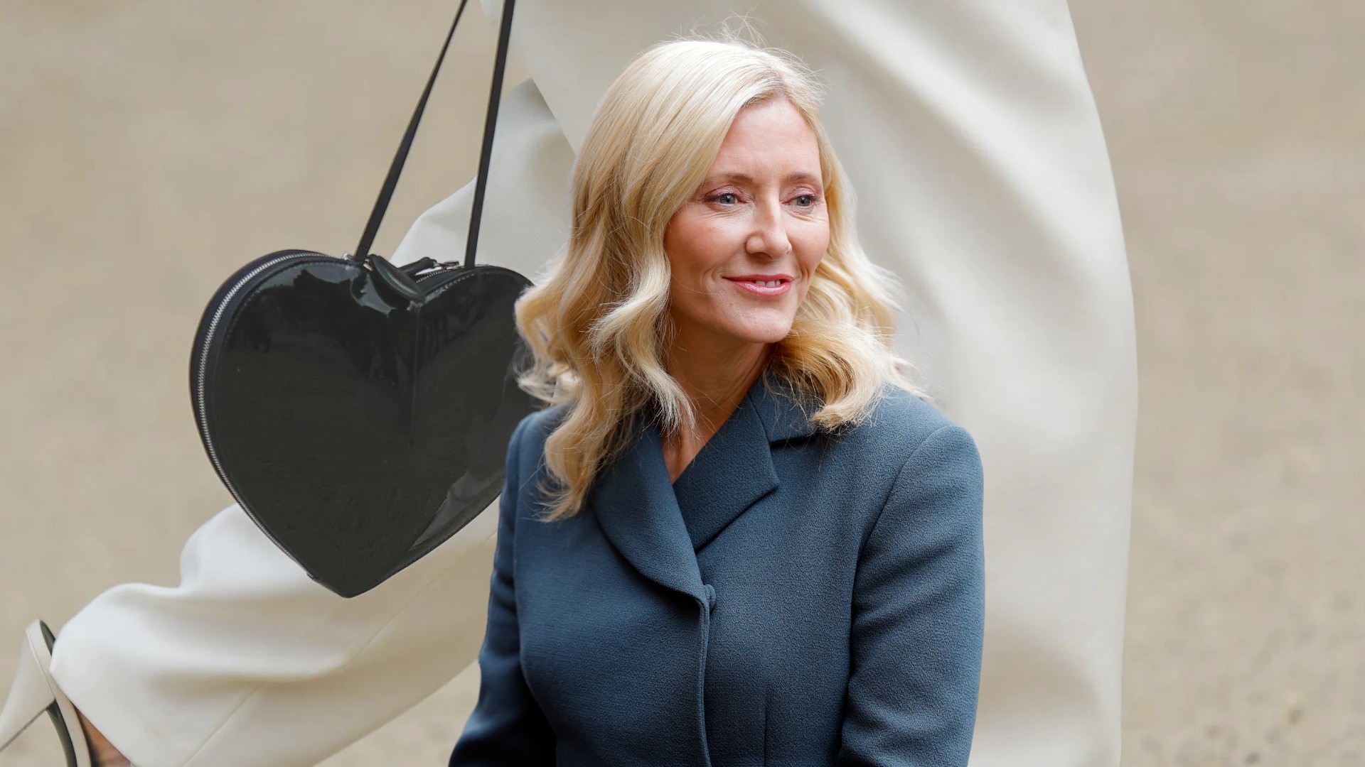 Crown Princess Marie-Chantal’s heart-shaped bag was the ideal choice for this poignant family occasion