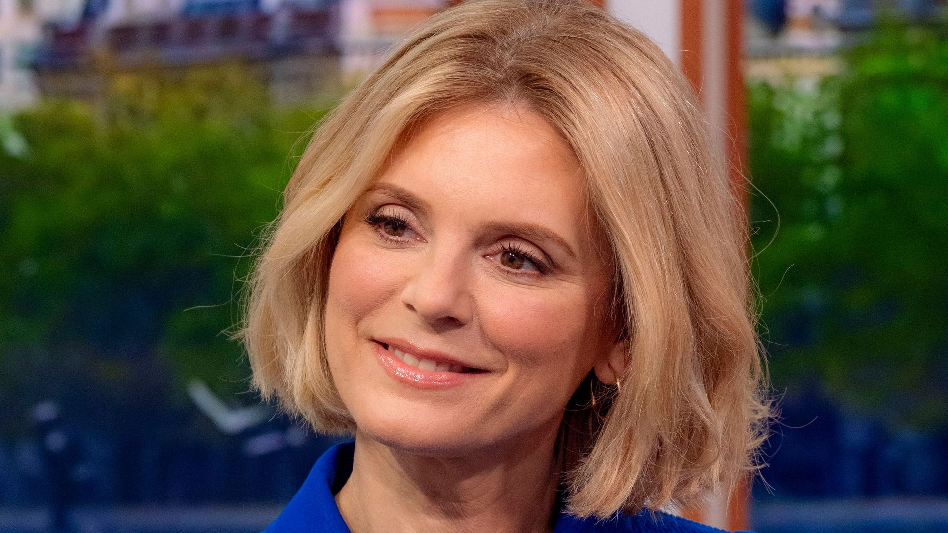 Emilia Fox sat down in tv studio in cobalt dress