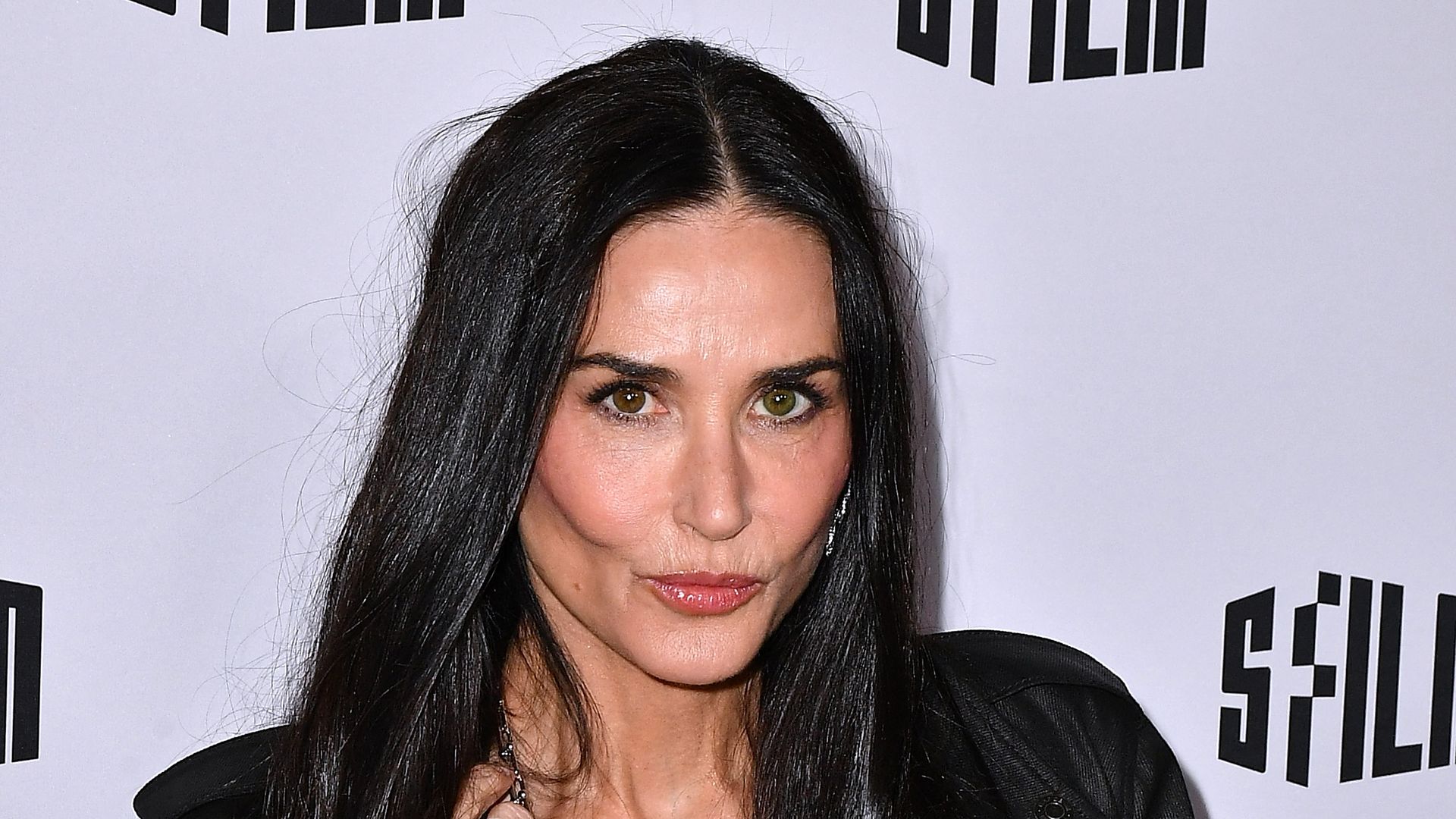 Demi Moore in black on the red carpet