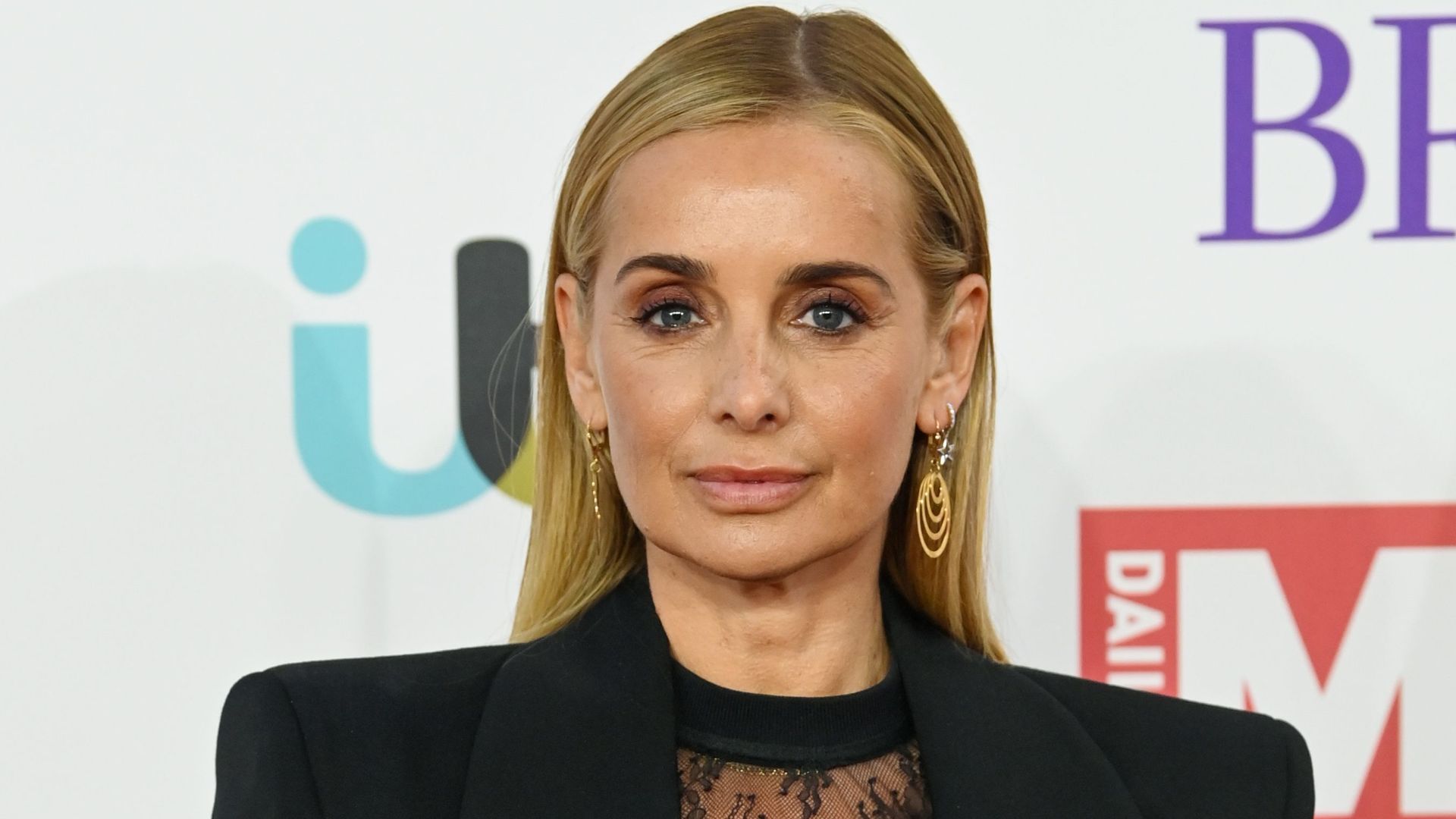 Louise Redknapp is the ultimate cool girl in latex trousers and tuxedo shirt