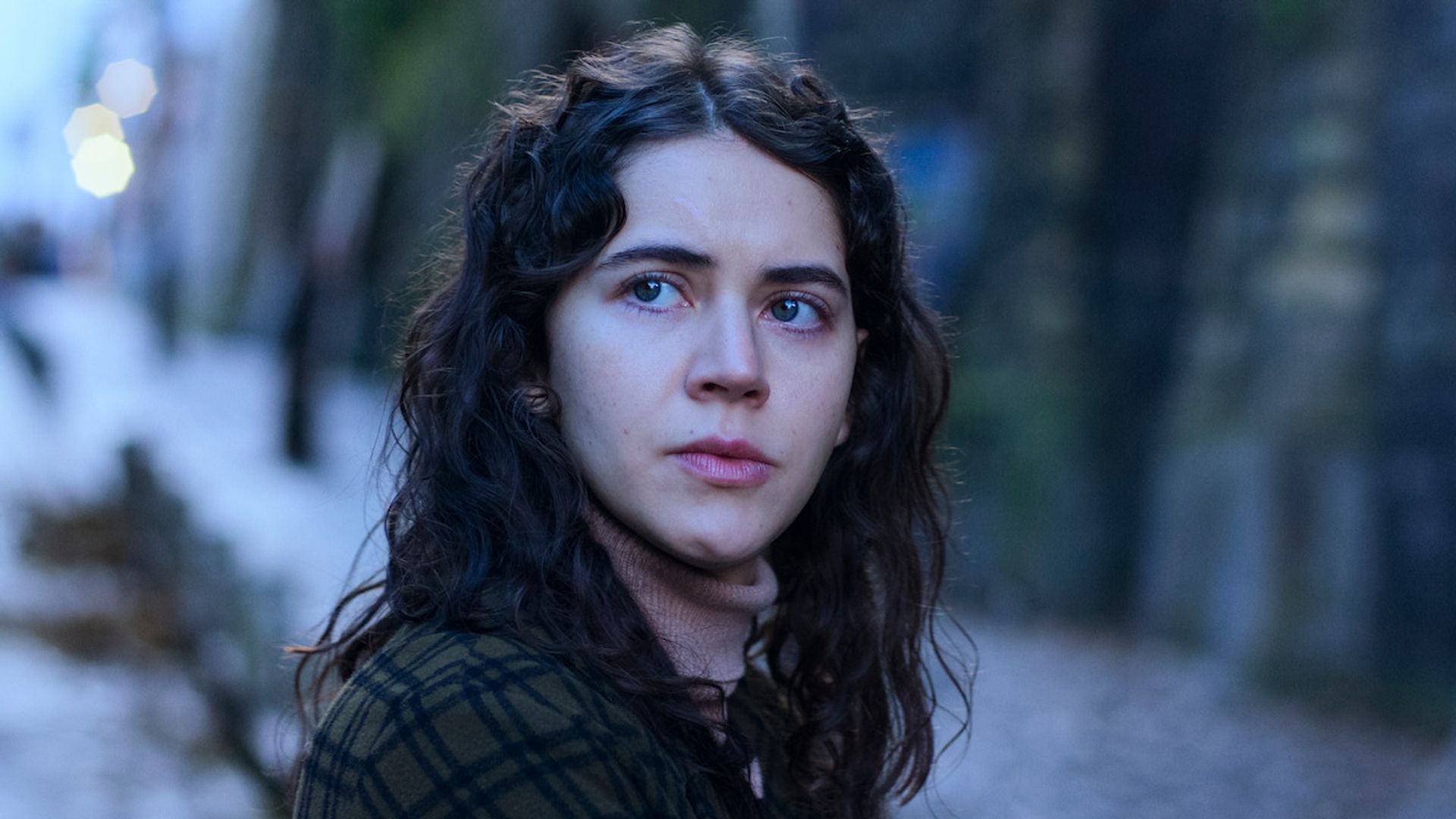 close-up brunette woman in street