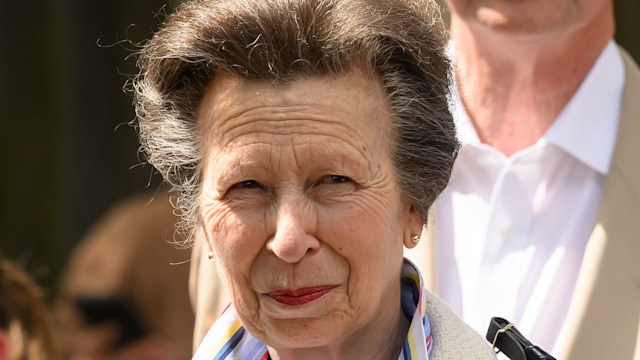 Princess Anne and Sir Tim Laurence walking