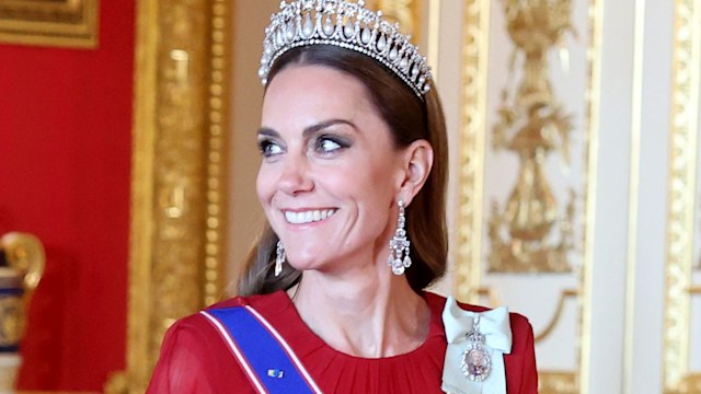 Kate Middleton smiling in diamond tiara and earrings