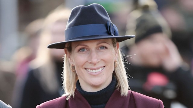 Zara Tindall in a maroon coat