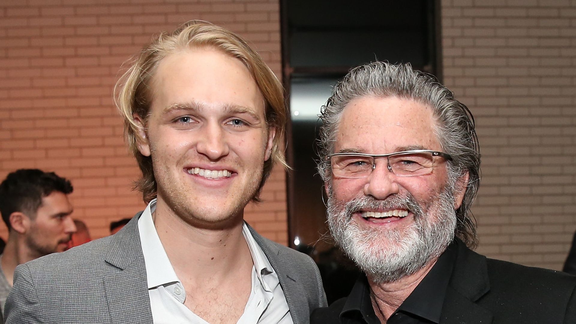 Wyatt Russell (L) and Kurt Russell pose for pictures