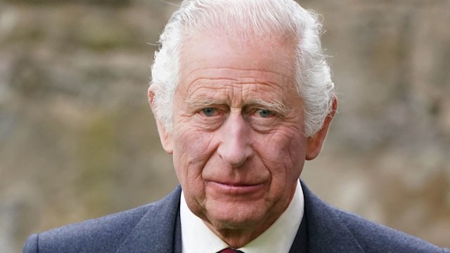 King Charles wearing dark suit