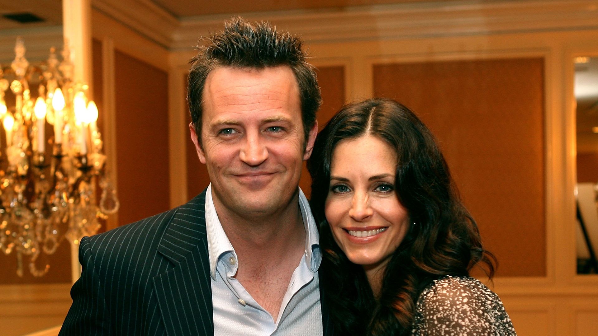 Matthew Perry and actress Courteney Cox Arquette mingle at the AFI Associates luncheon honoring Hollywood's Arquette family with the 6th Annual "Platinum Circle Award" held at the Regent Beverly Wilshire Hotel on May 10, 2006 in Beverly Hills, California