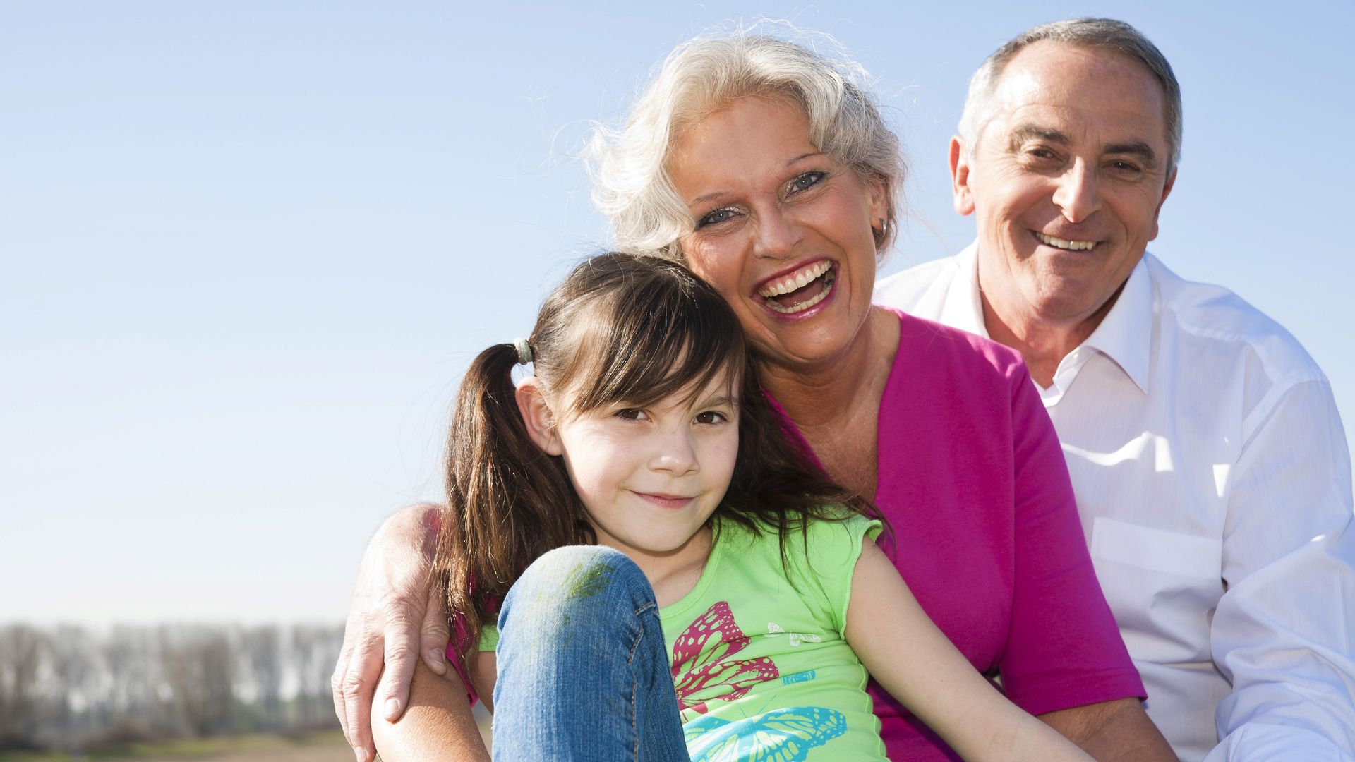 Grandmother and grandfather with grandchild