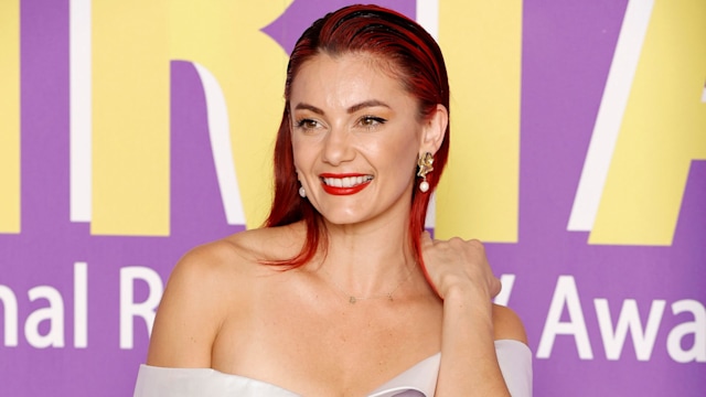 Dianne Buswell in a white dress