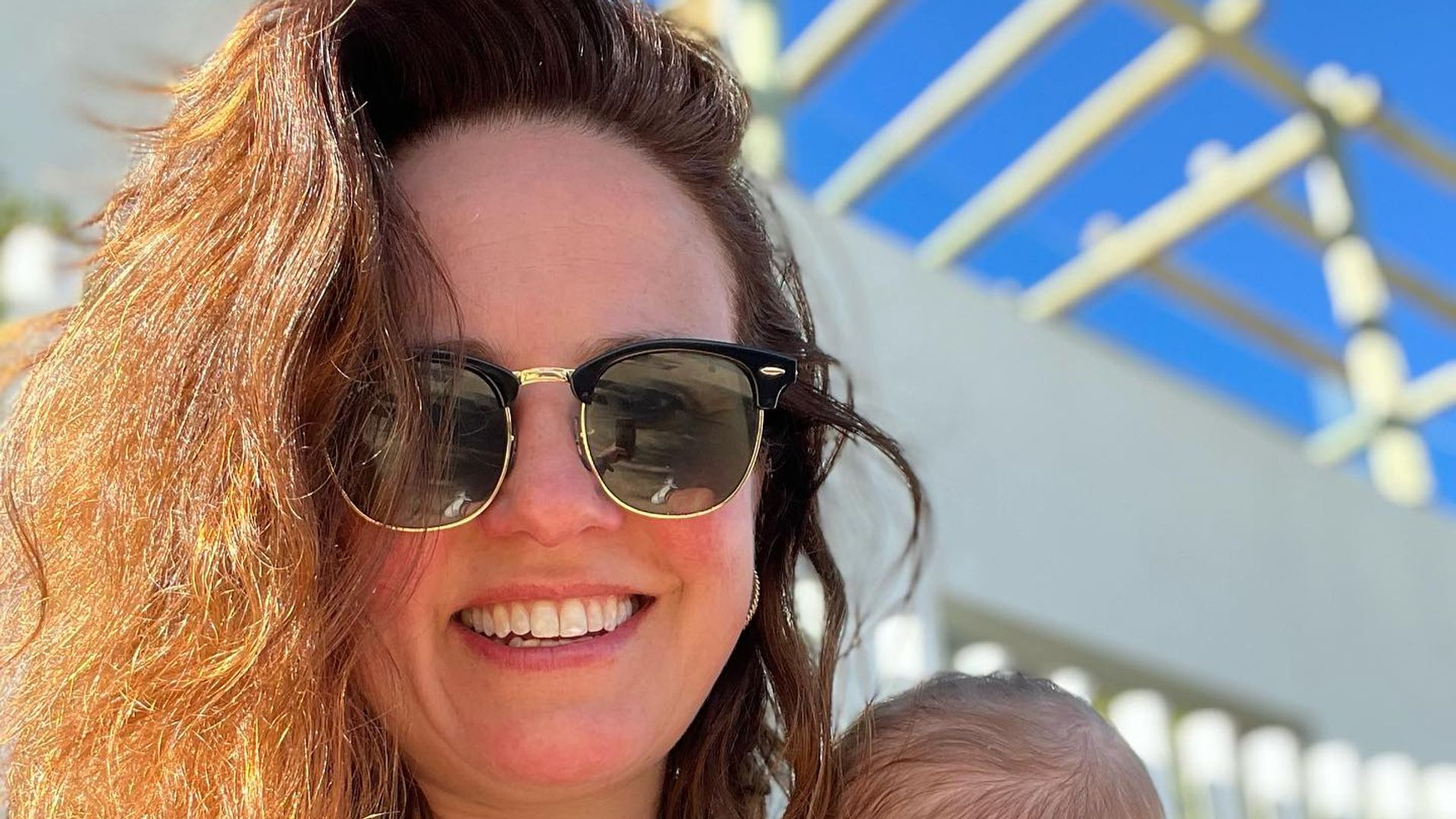 Nina Warhurst stuns in bold swimsuit during idyllic family holiday