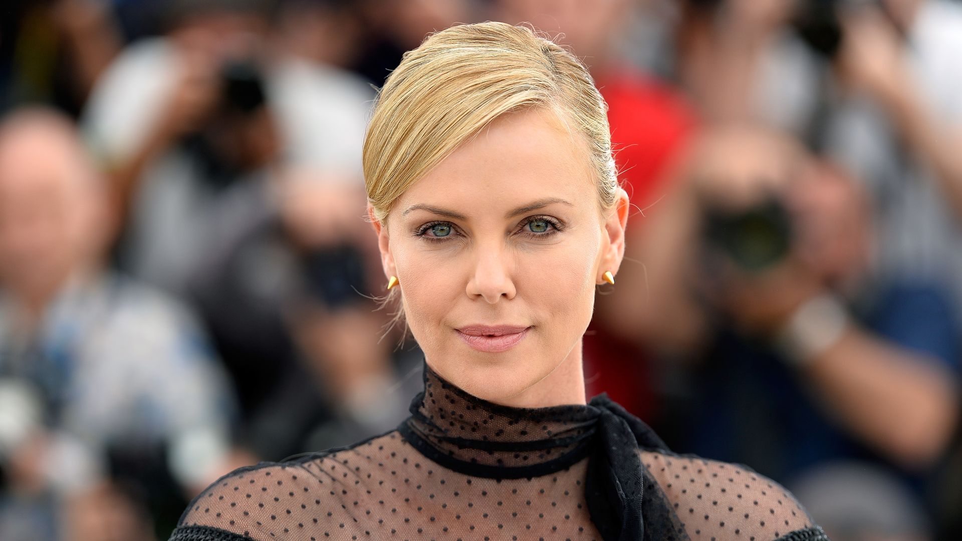 Charlize Theron attends a photocall for "Mad Max: Fury Road" during the 68th annual Cannes Film Festival