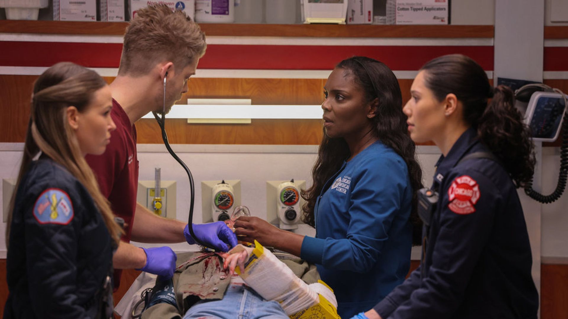 Jocelyn Hudon as Lizzy Novak, Luke Mitchell as Dr. Mitch Ripley, Marlyne Barrett as Maggie Lockwood, Hanako Greensmith as Violet Mikami in Chicago Med