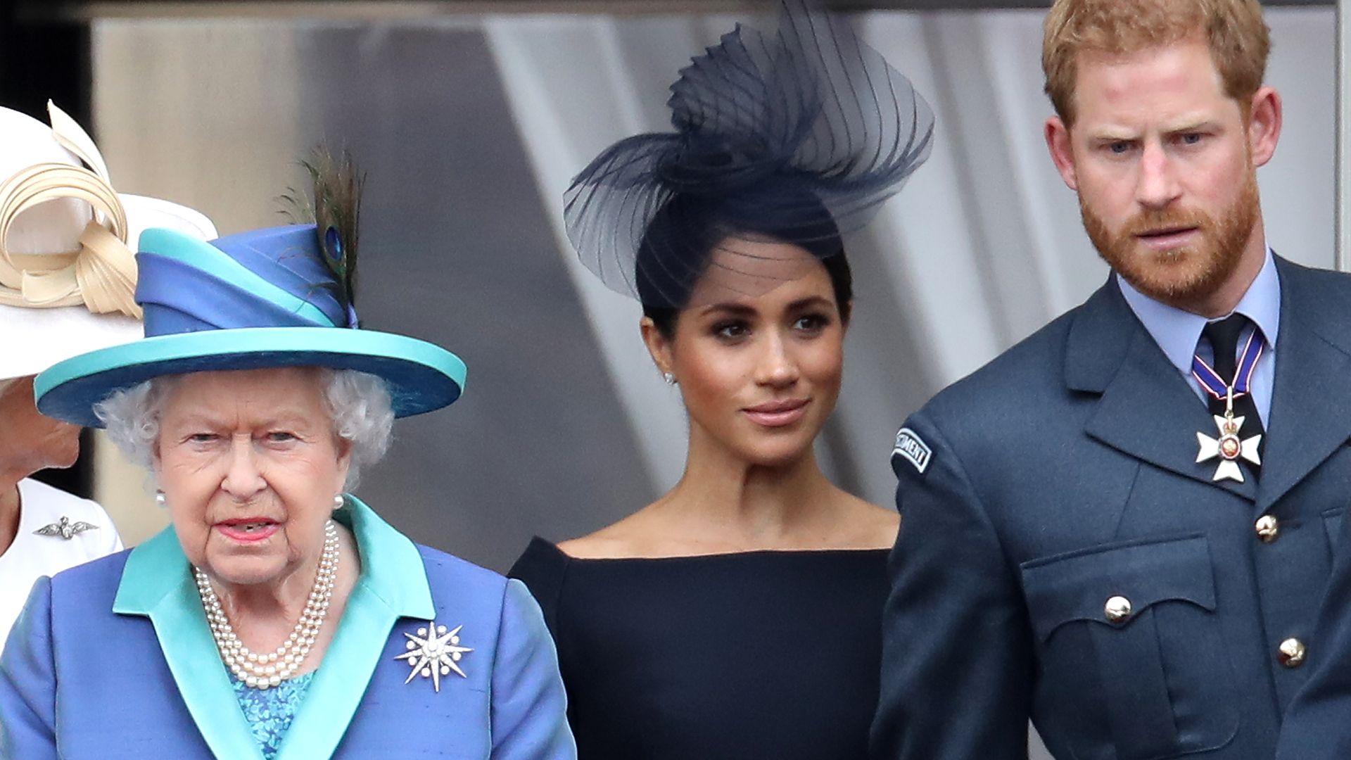 Queen Elizabeth II, Prince Harry and Meghan Markle on the balcony of Buckingham Palace