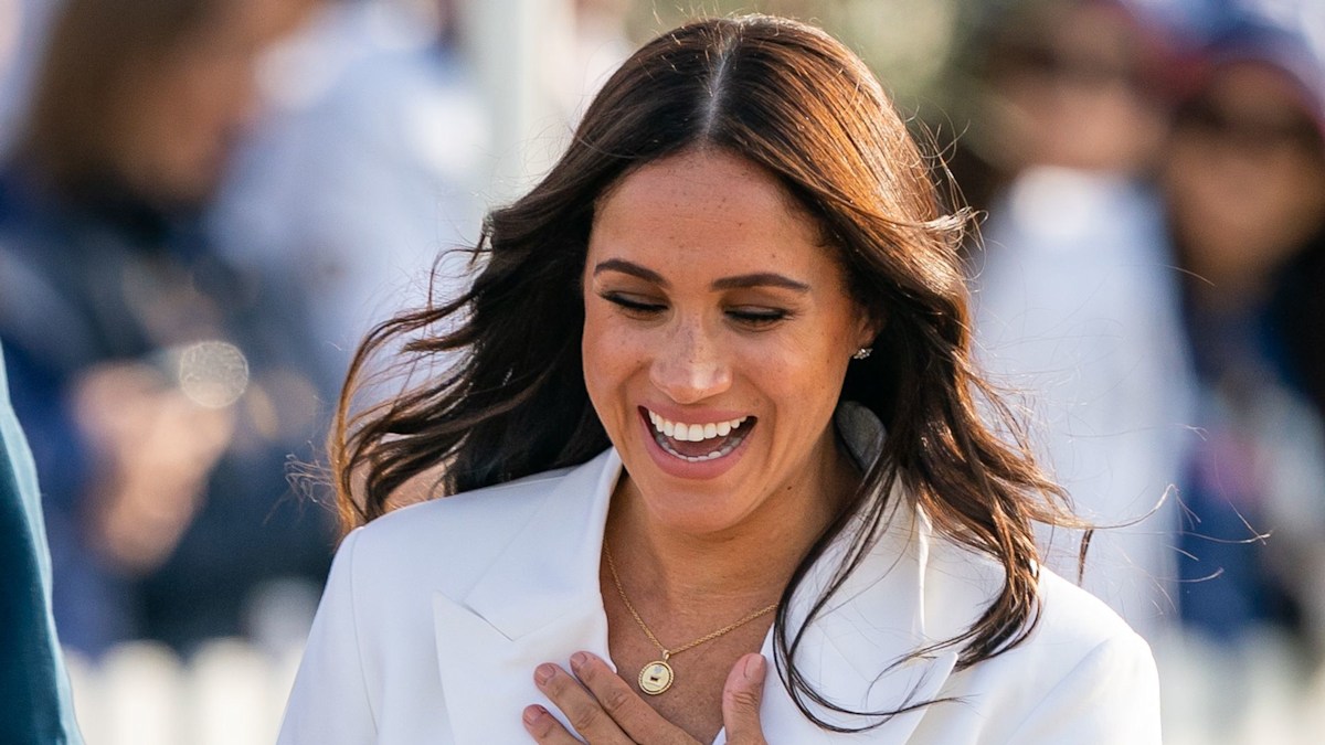 Meghan Markle gives son Archie a piggyback in endless garden at private mansion in clip you might have missed