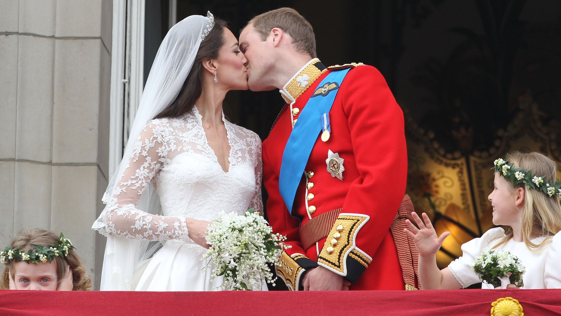 Kate Middleton and Prince William kissing with Grace Van Cutsem covering her ears