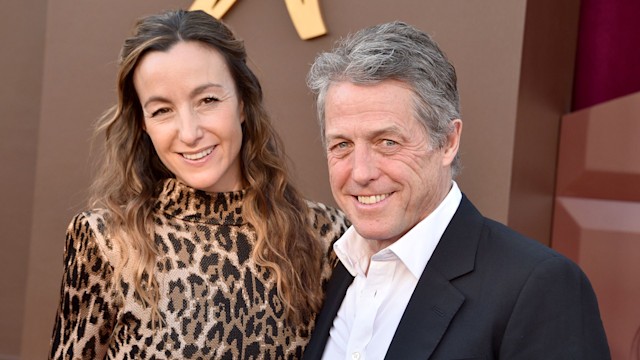  Anna Eberstein and Hugh Grant on red carpet