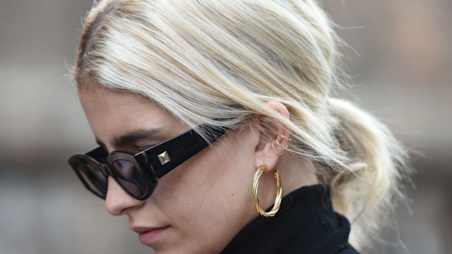 Street style woman with gold hoops