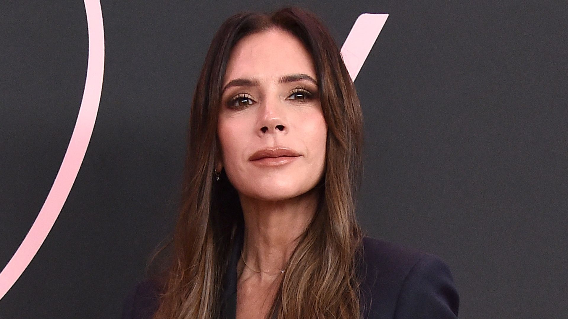 Victoria Beckham posed in black jumpsuit