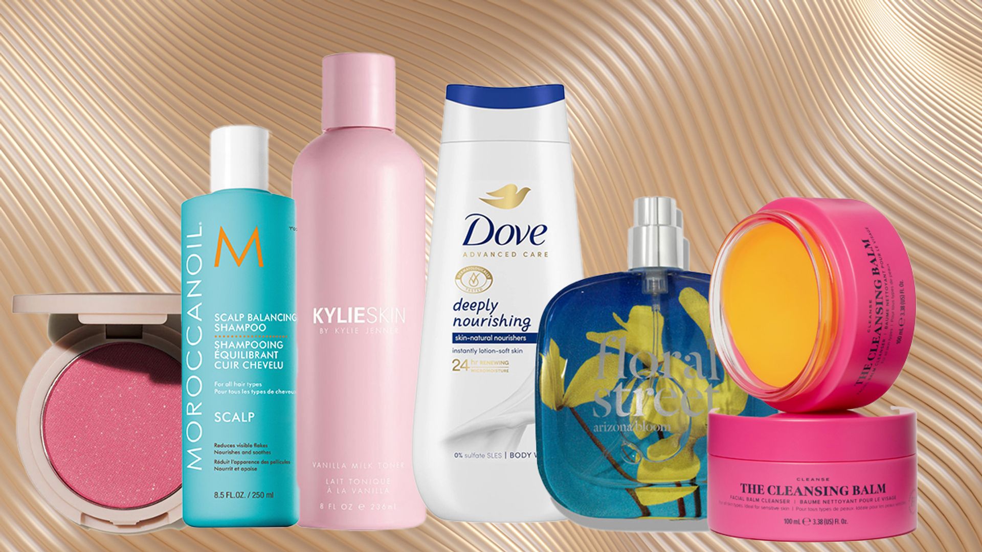 collage of beauty products on a silk gold background 