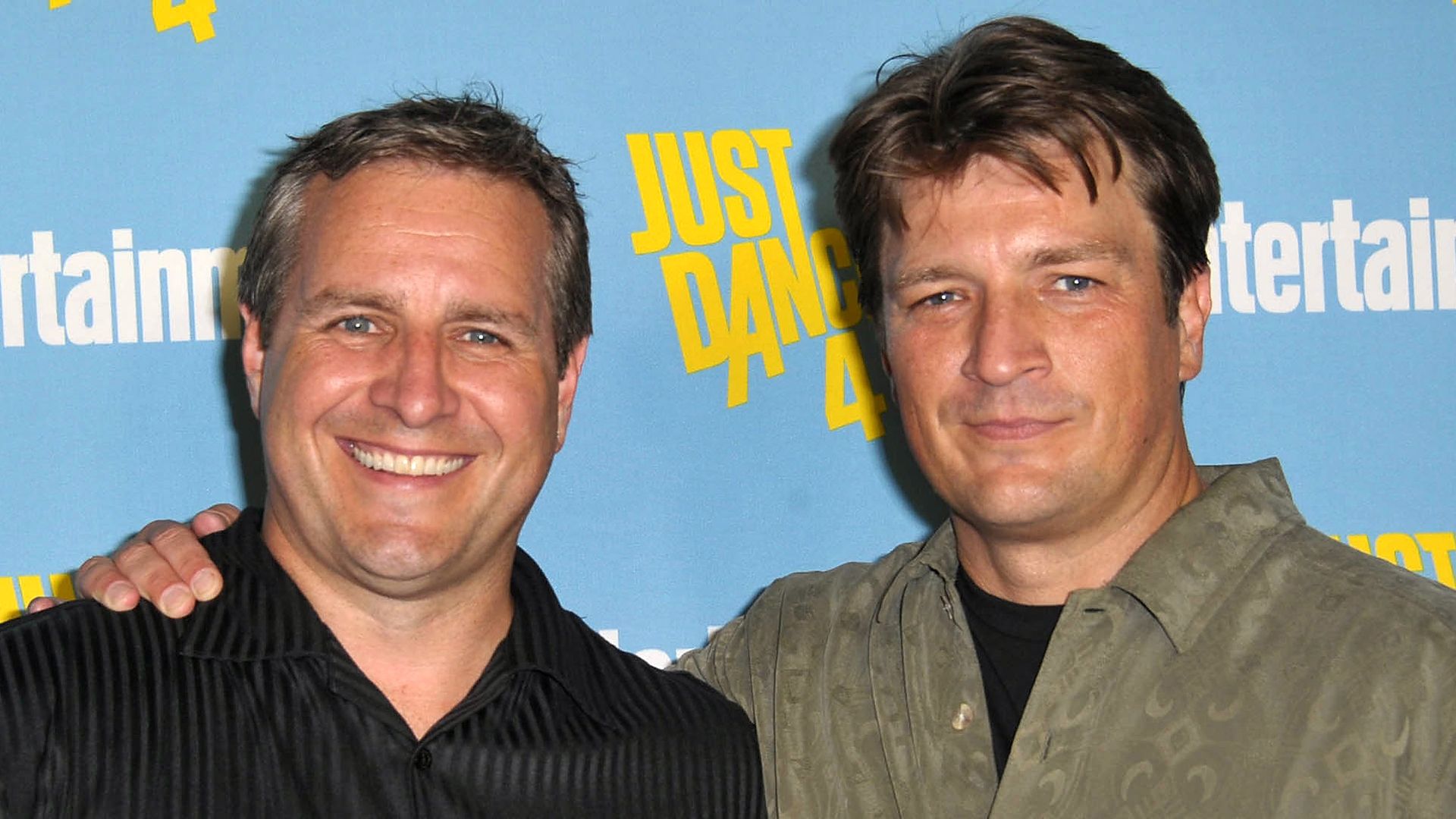 Nathan and Jeff Fillion pose together at Entertainment Weekly's Comic-Con Celebration in 2012