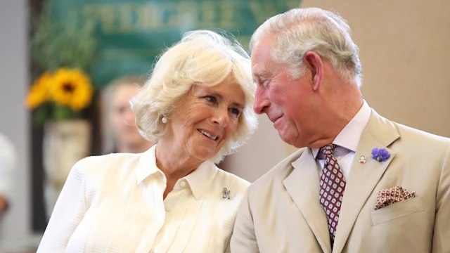 King Charles and Queen Camilla gazing at eachother lovingly