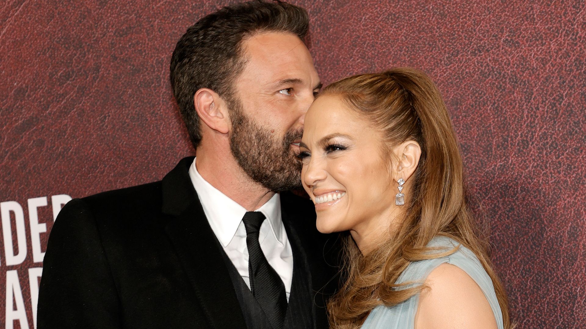 Ben Affleck kissing Jennifer Lopez on the cheek