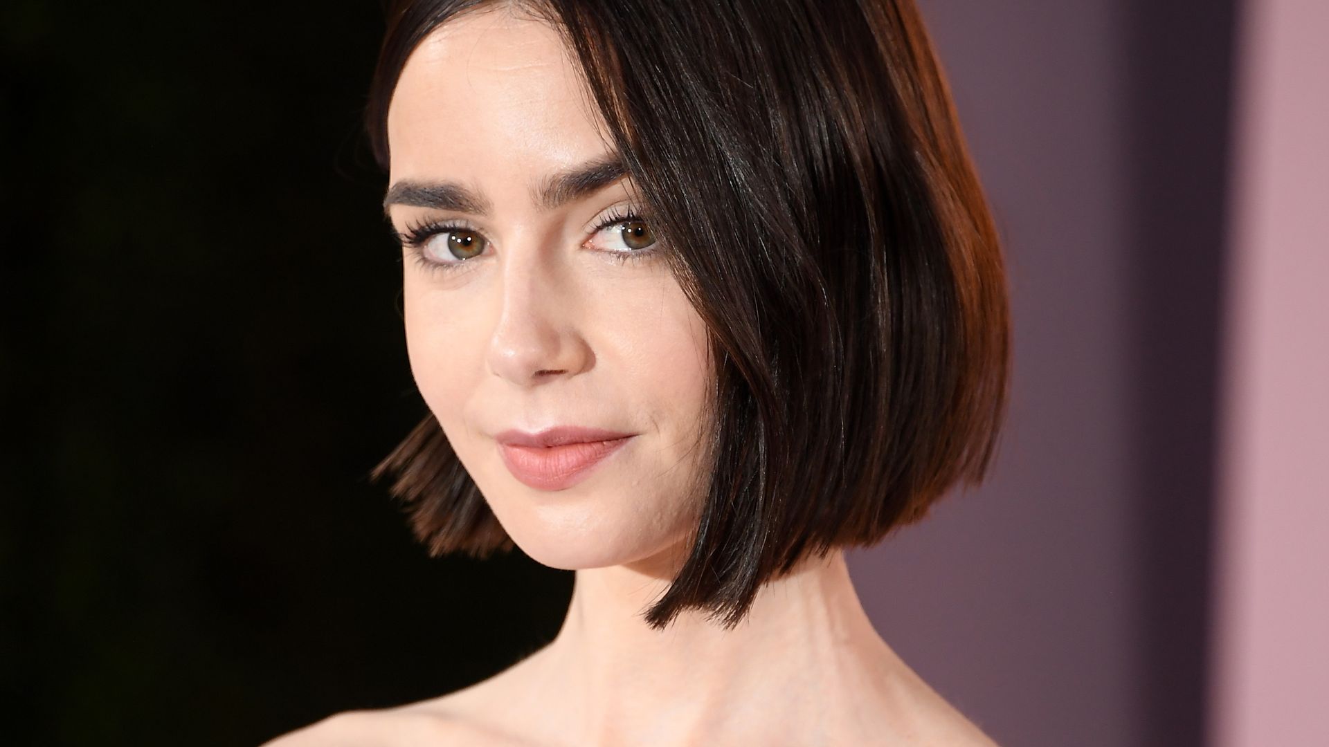 Lily Collins goes method in sparkles for Emily In Paris premiere