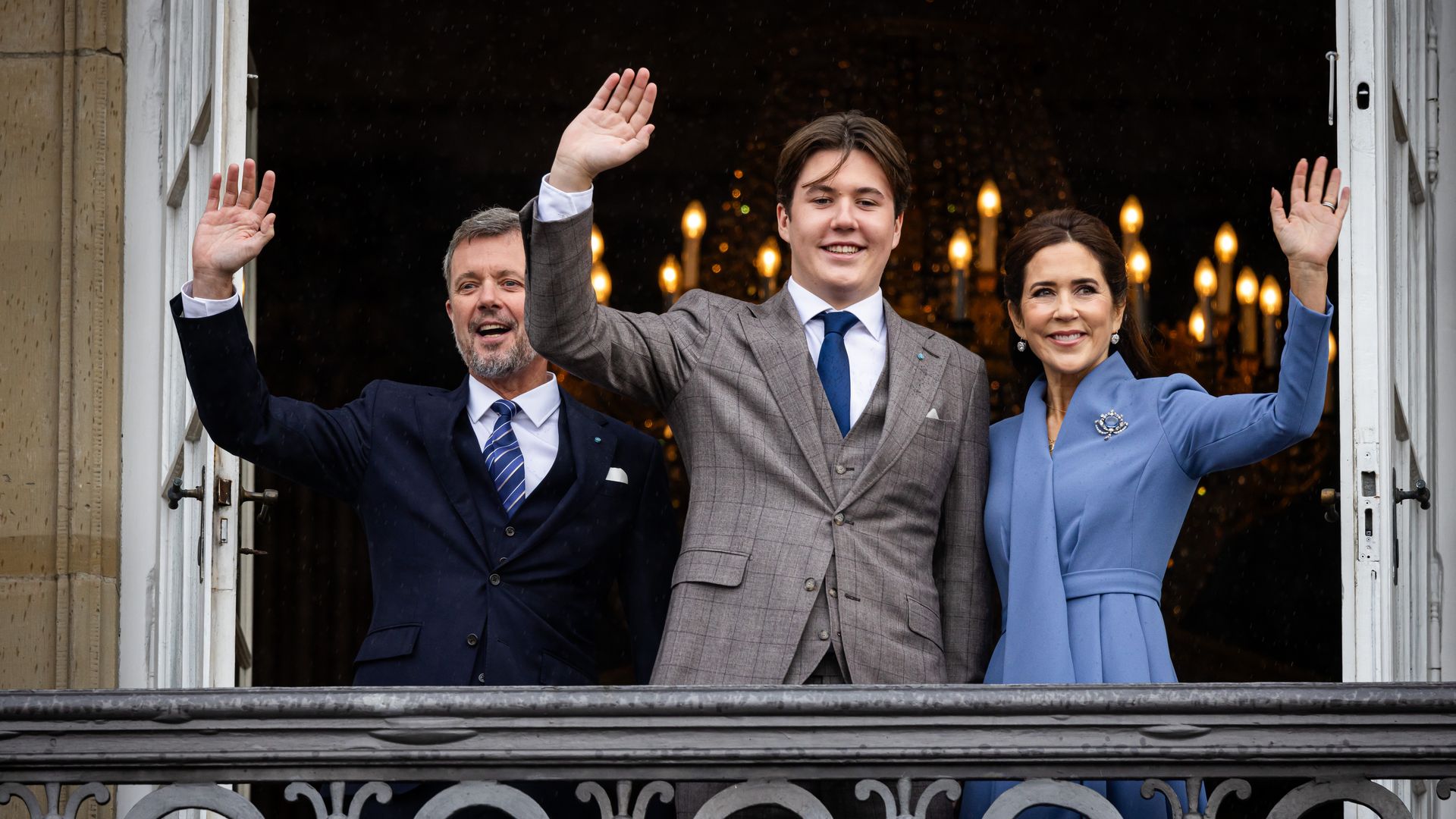 Crown Prince Frederik and Crown Princess Mary with Prince Christian on balcony