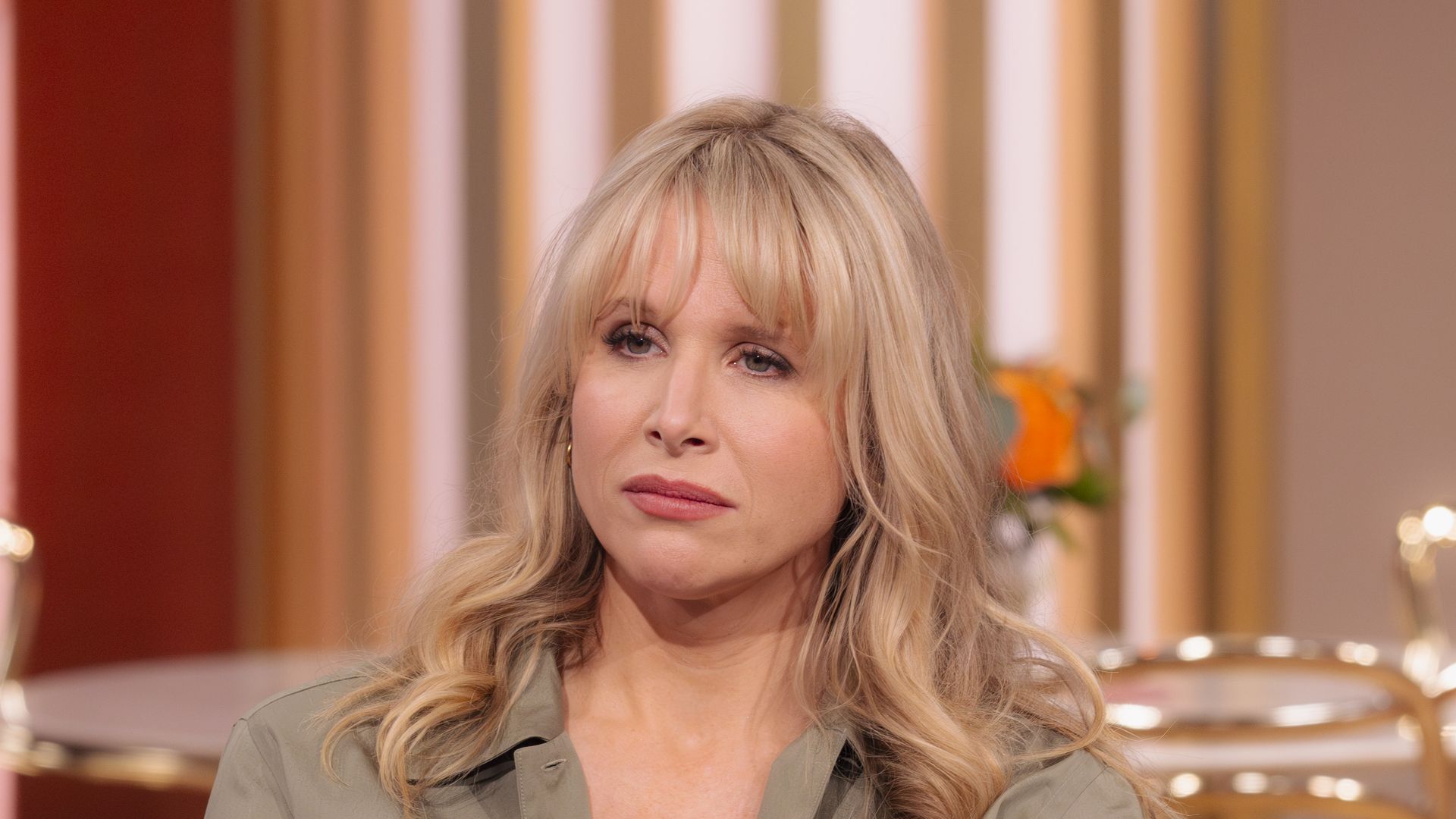 lucy punch in green blouse on this morning sofa