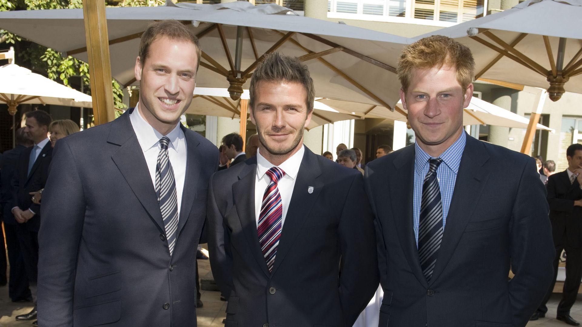 Prince William standing with David Beckham and Prince Harry